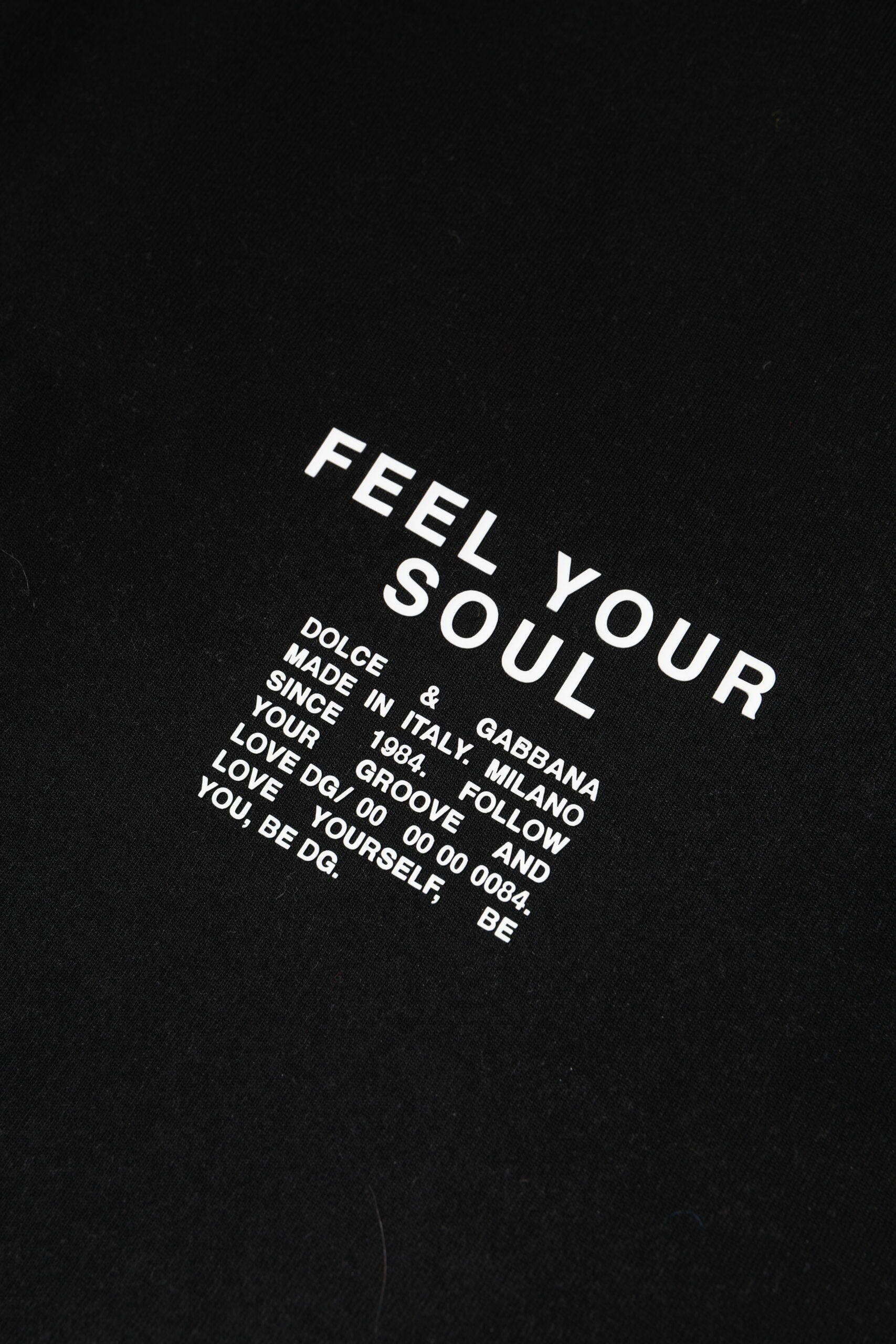 Black t-shirt with white lettering