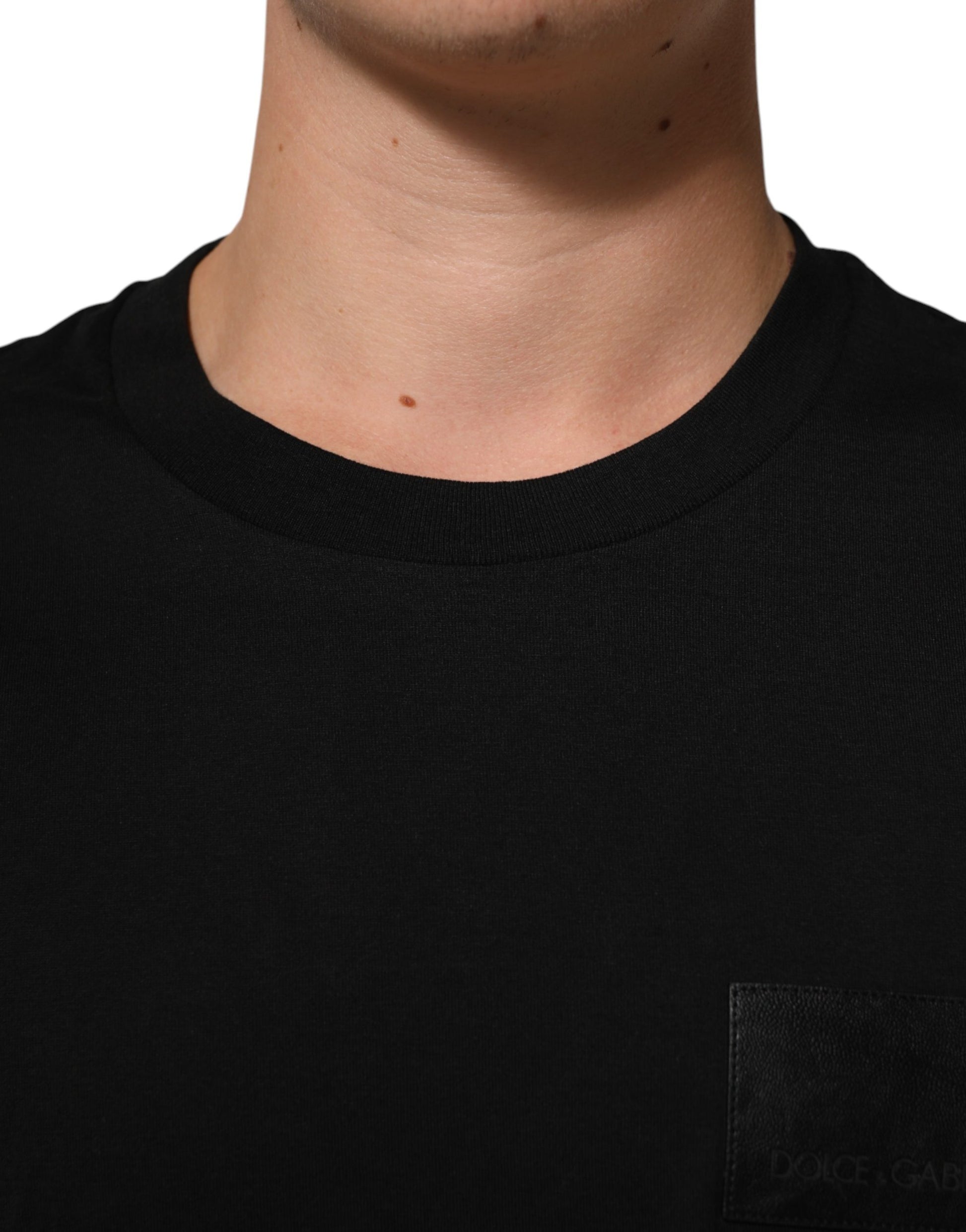 Black short sleeve shirt with pocket on front