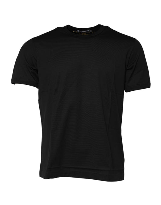 Black short sleeved t-shirt on a hanger