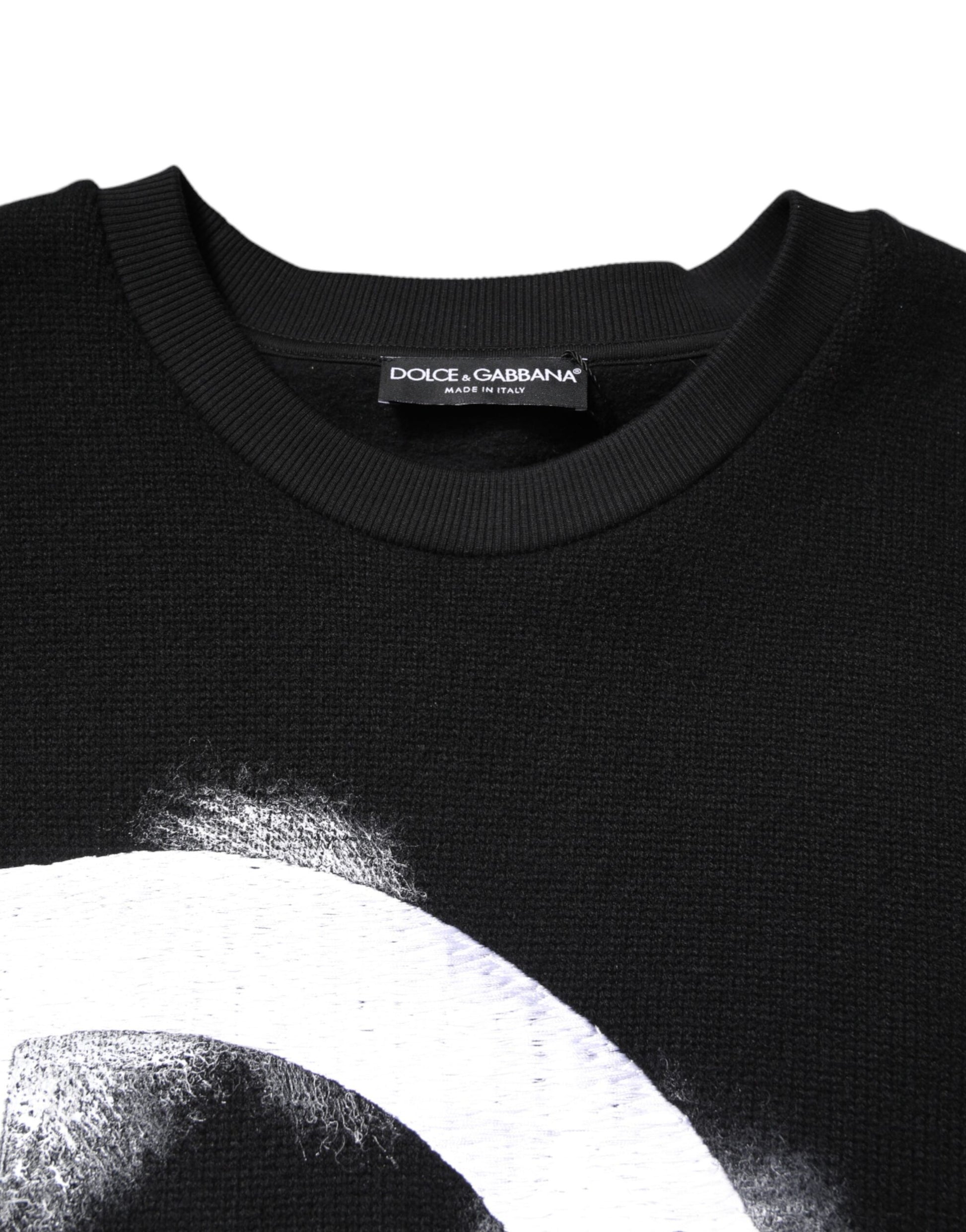 Black sweater with white design on front