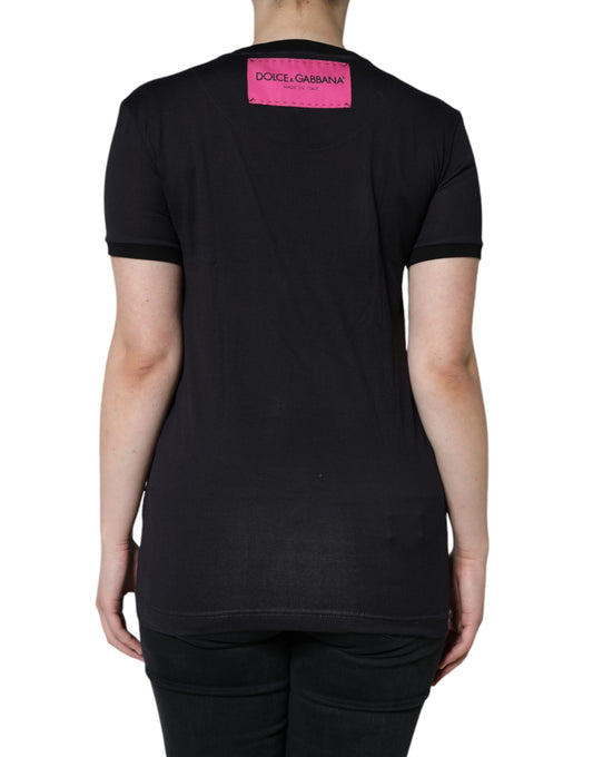 Black t-shirt with pink label on back