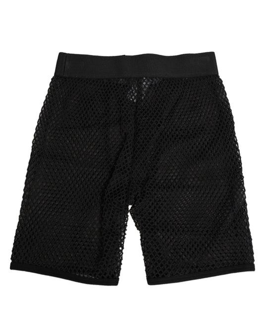 Black cotton shorts with logo detailing and midi length