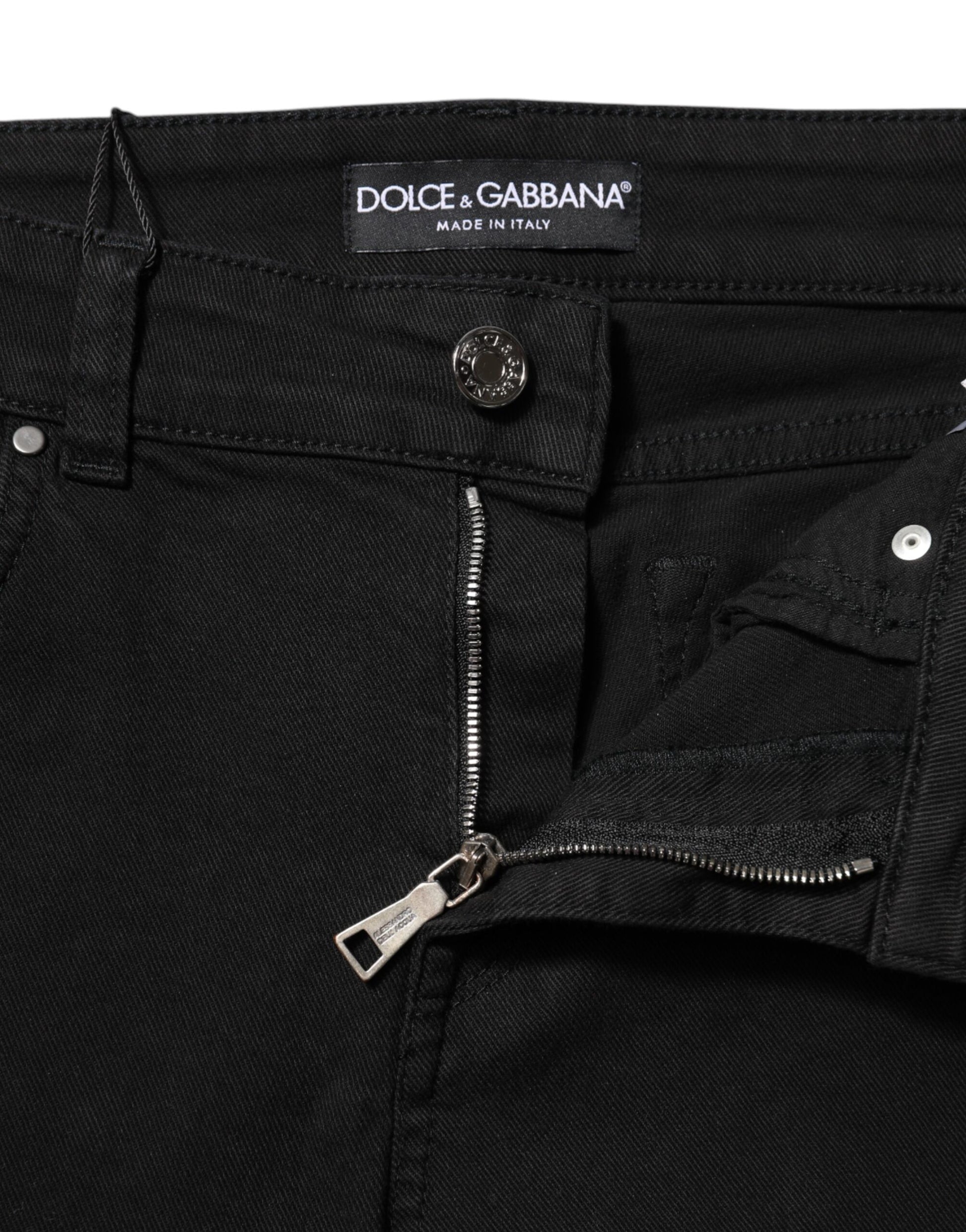 Pair of black jeans with zippered front closure