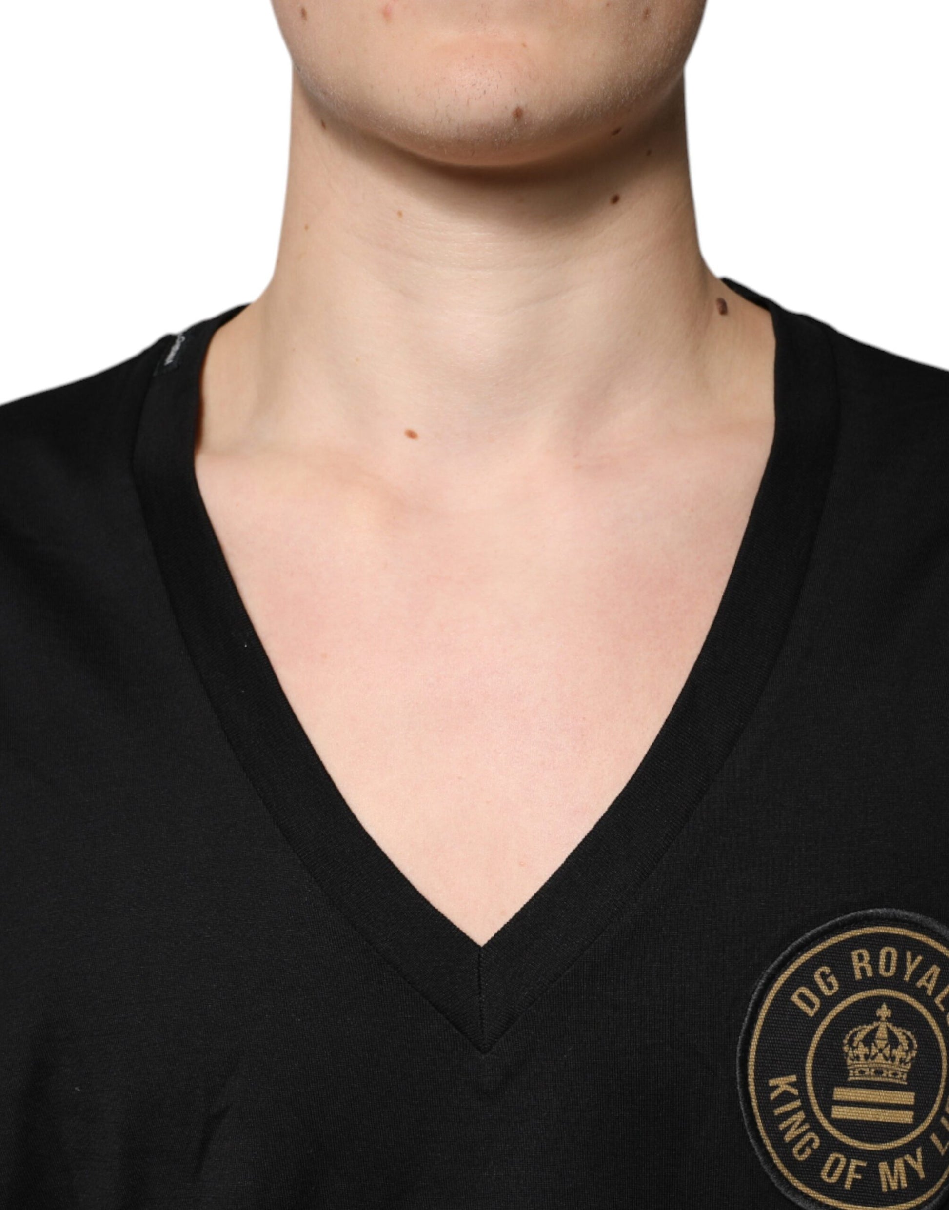 A black cotton v-neck t-shirt with a logo on the chest