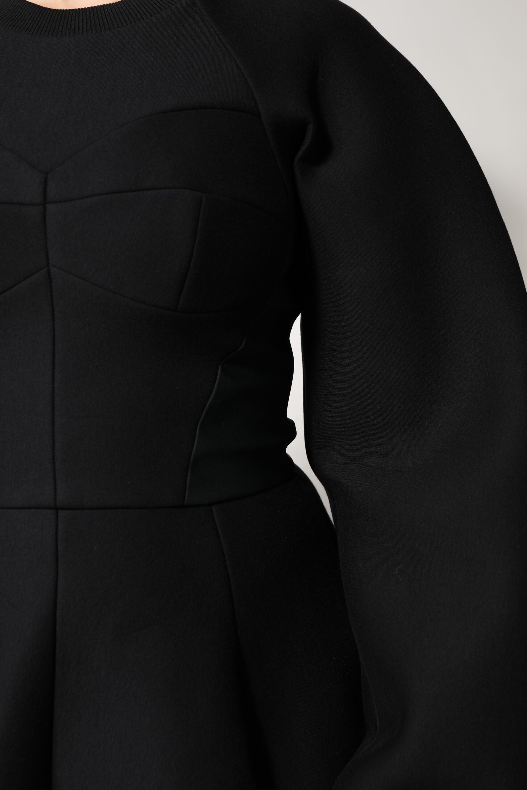 Black cotton long sleeve dress with A-line silhouette