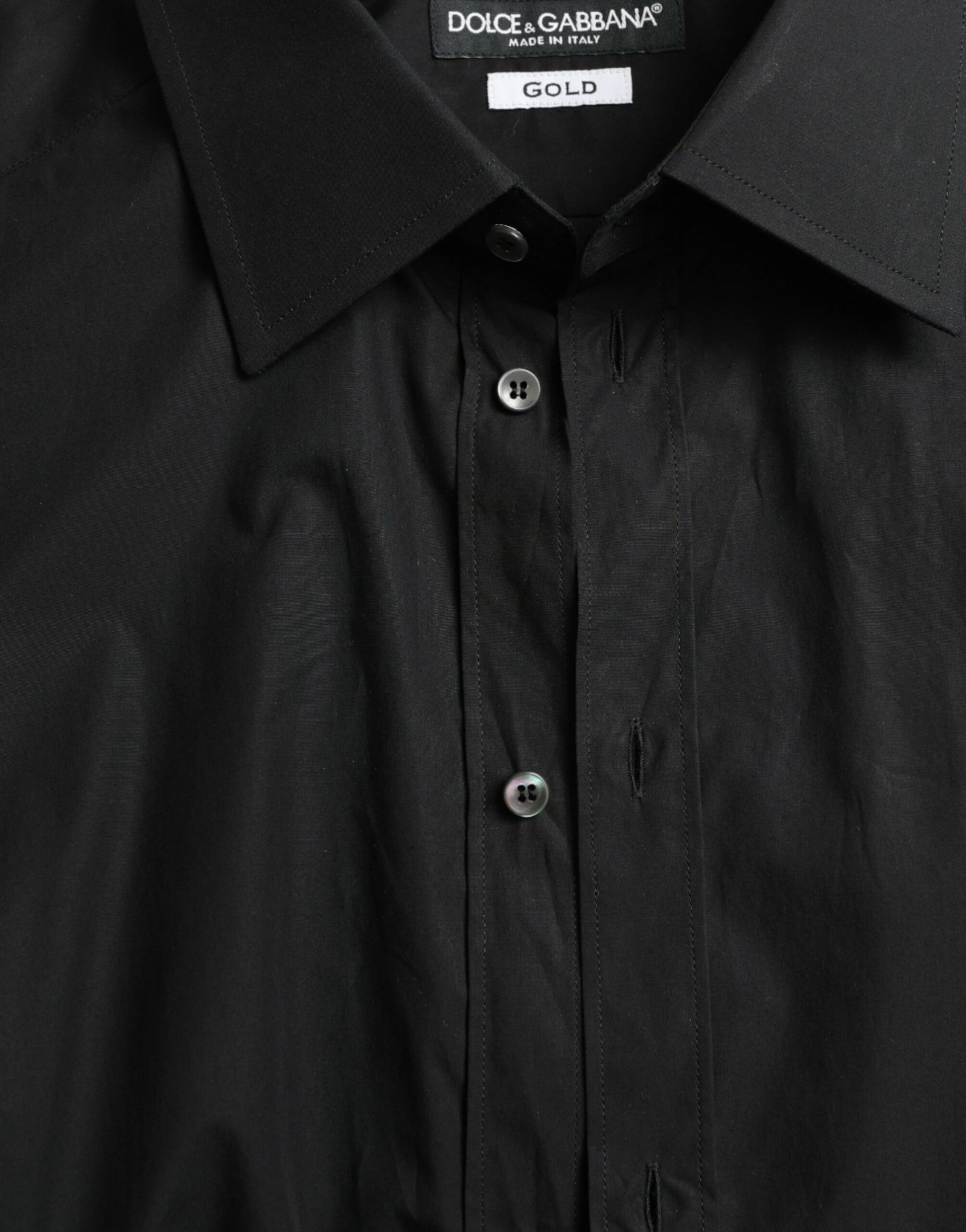 A black cotton men's formal shirt with gold accents from Dolce & Gabbana