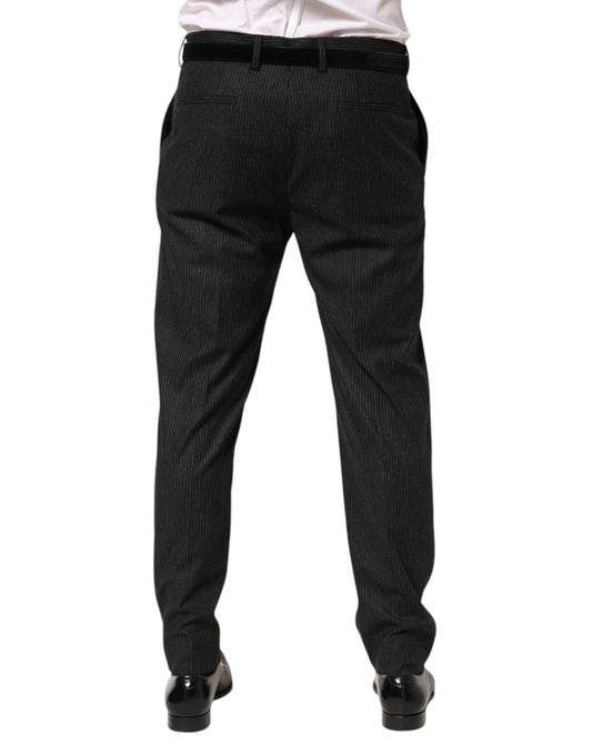 A pair of black mid-waist dress trousers with a subtle pattern