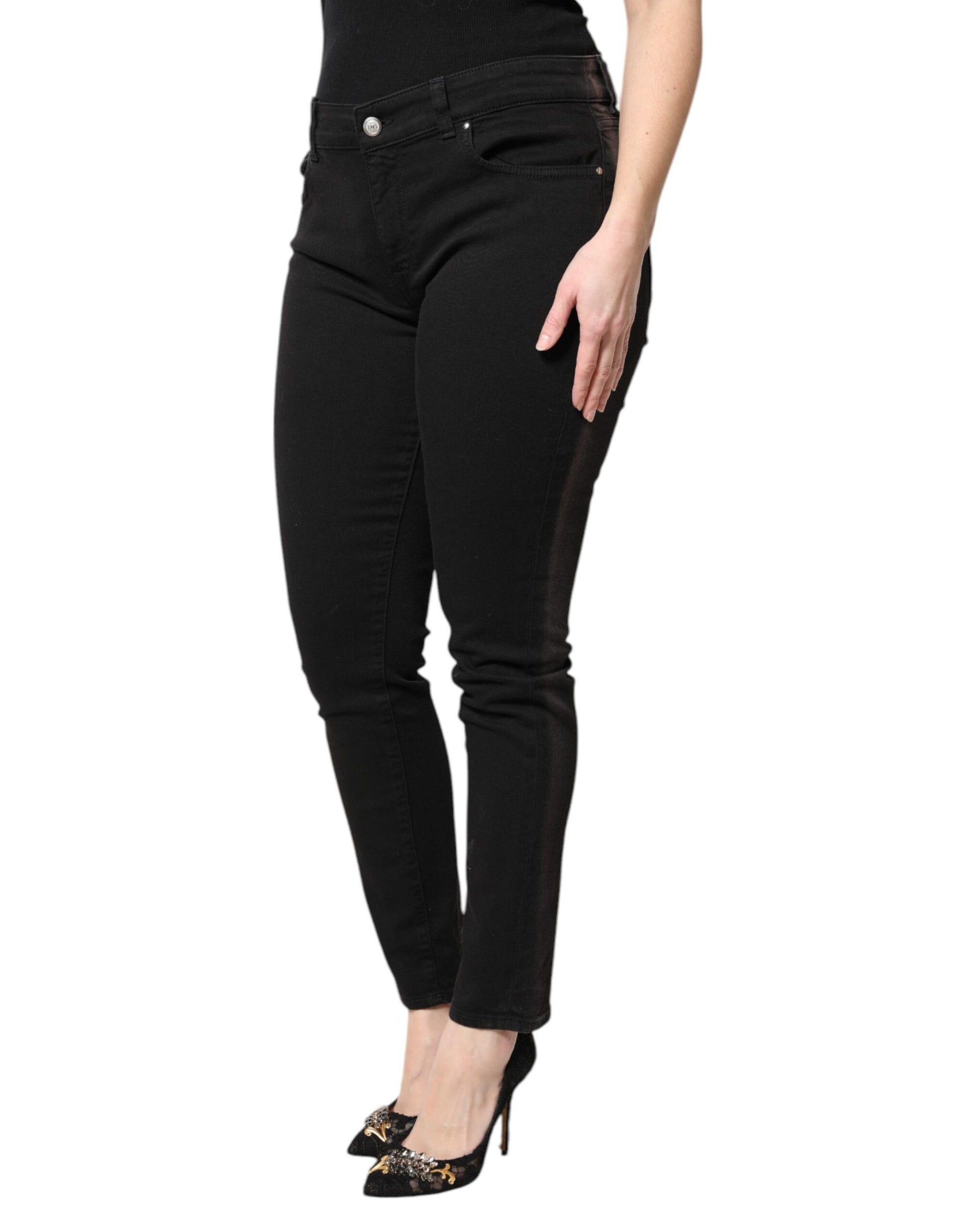 Woman wearing black pants and heels