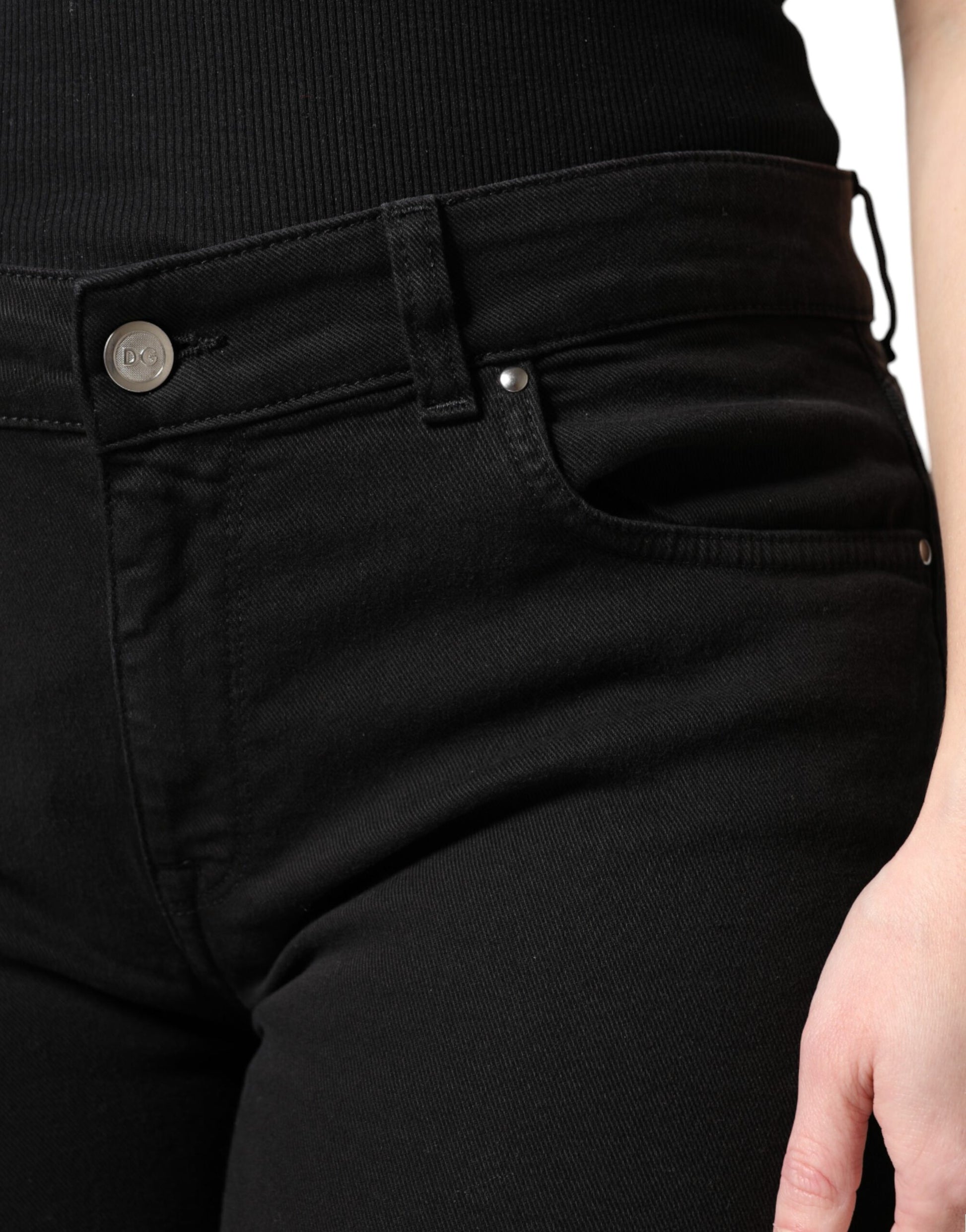 Pair of black jeans with two pockets on front