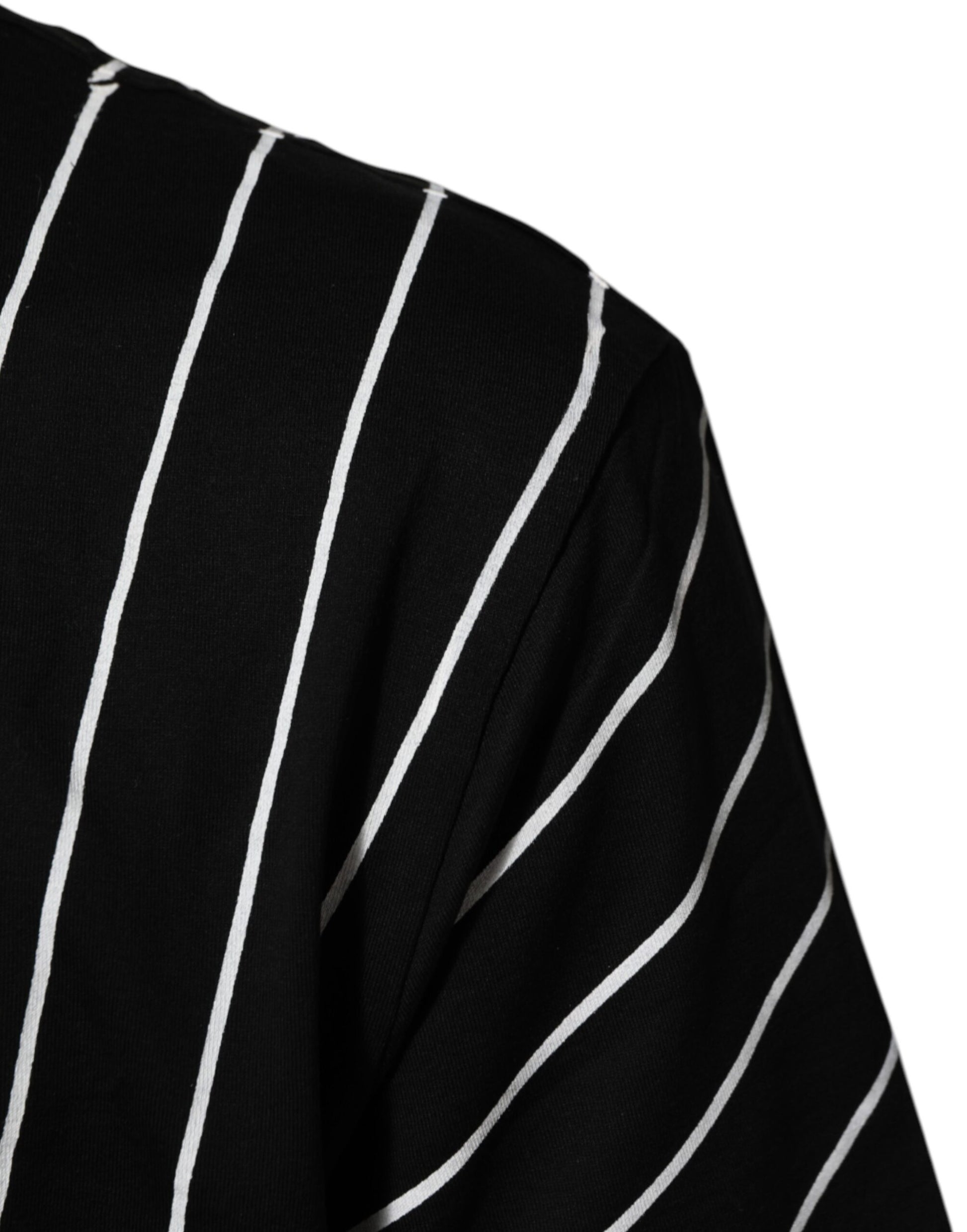 Black sweater with white stripes on sleeve