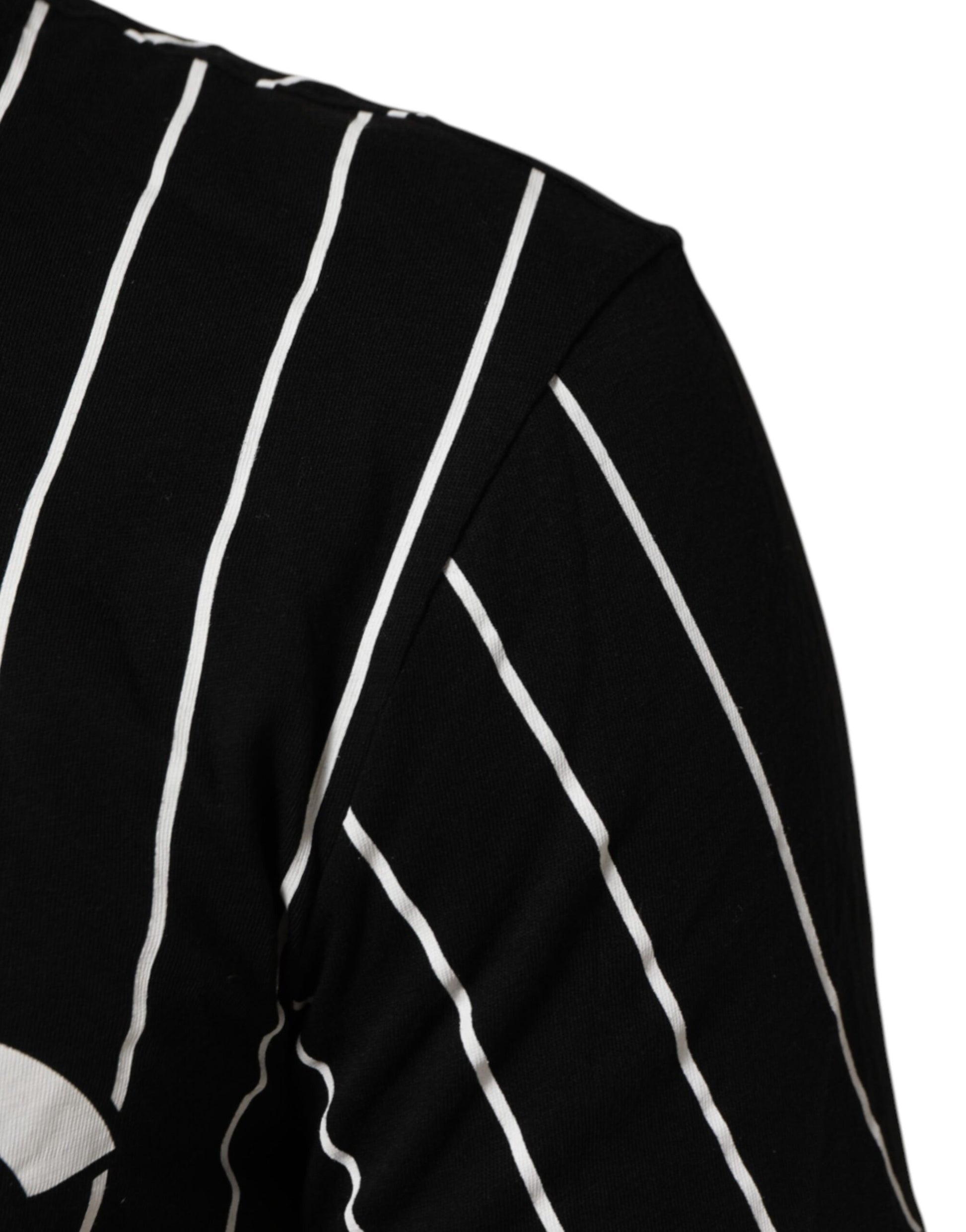 Black sweater with white stripes on sleeve