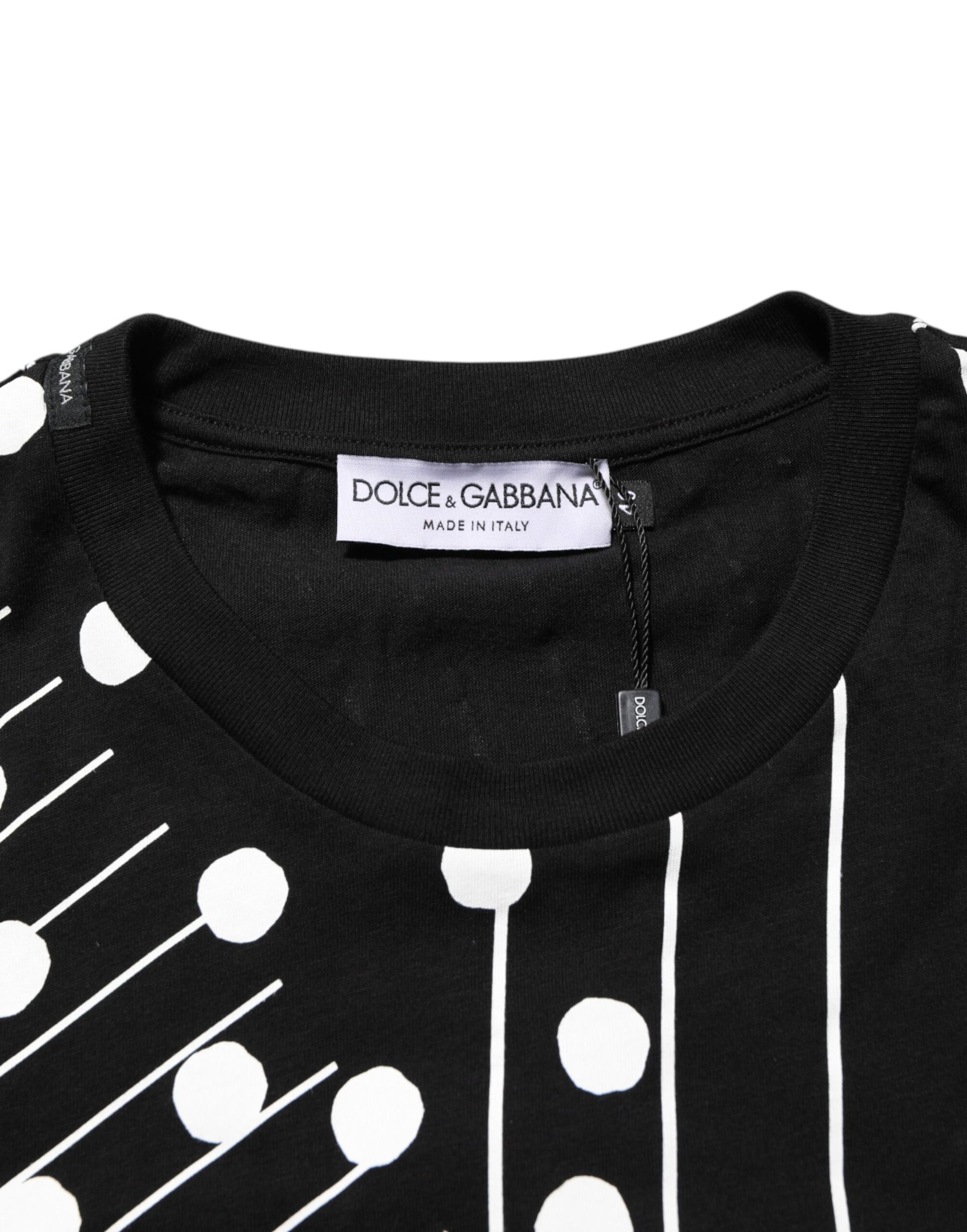 Black polka dot shirt on hanger