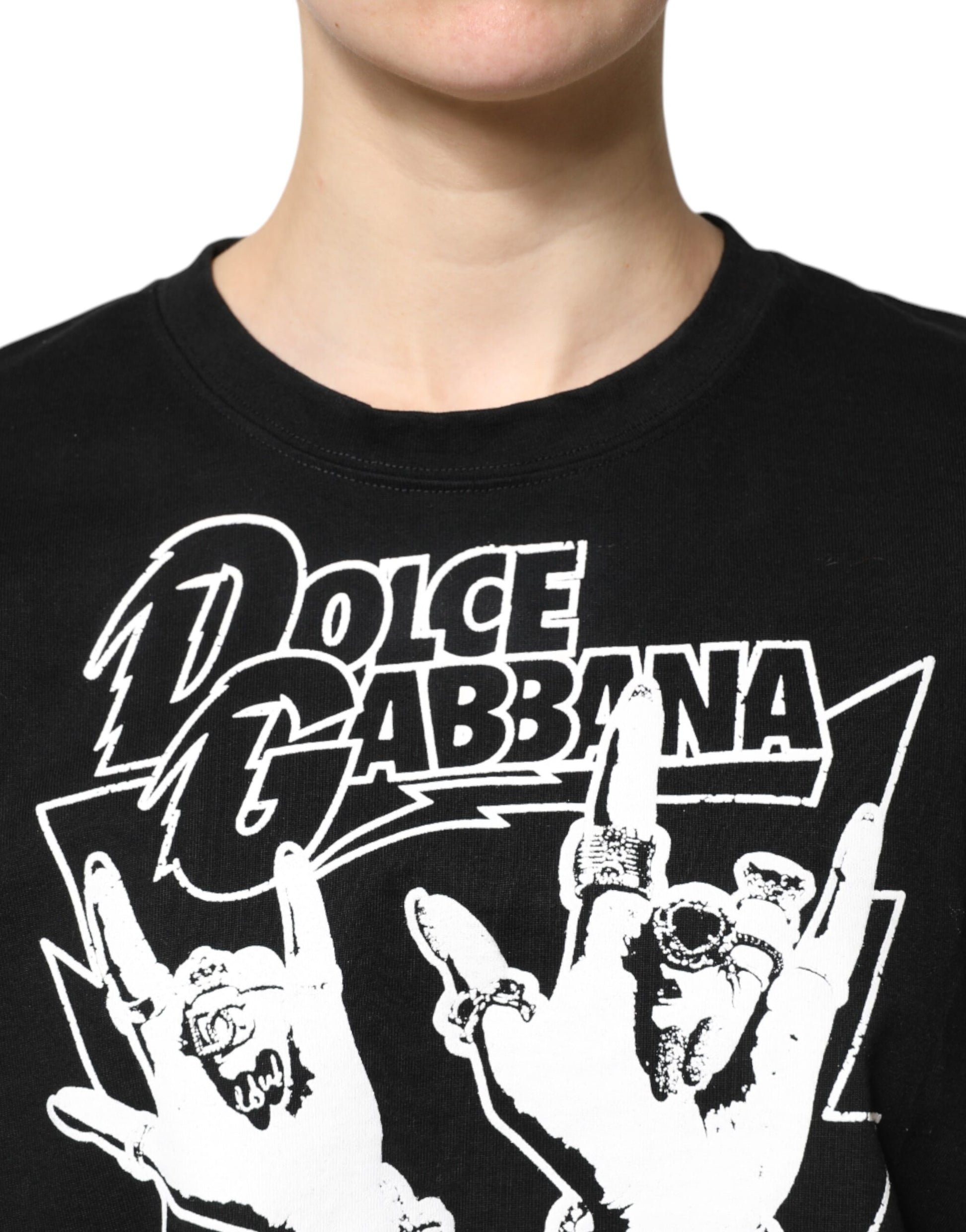 Black t-shirt with white graphic design featuring two hands making a peace sign