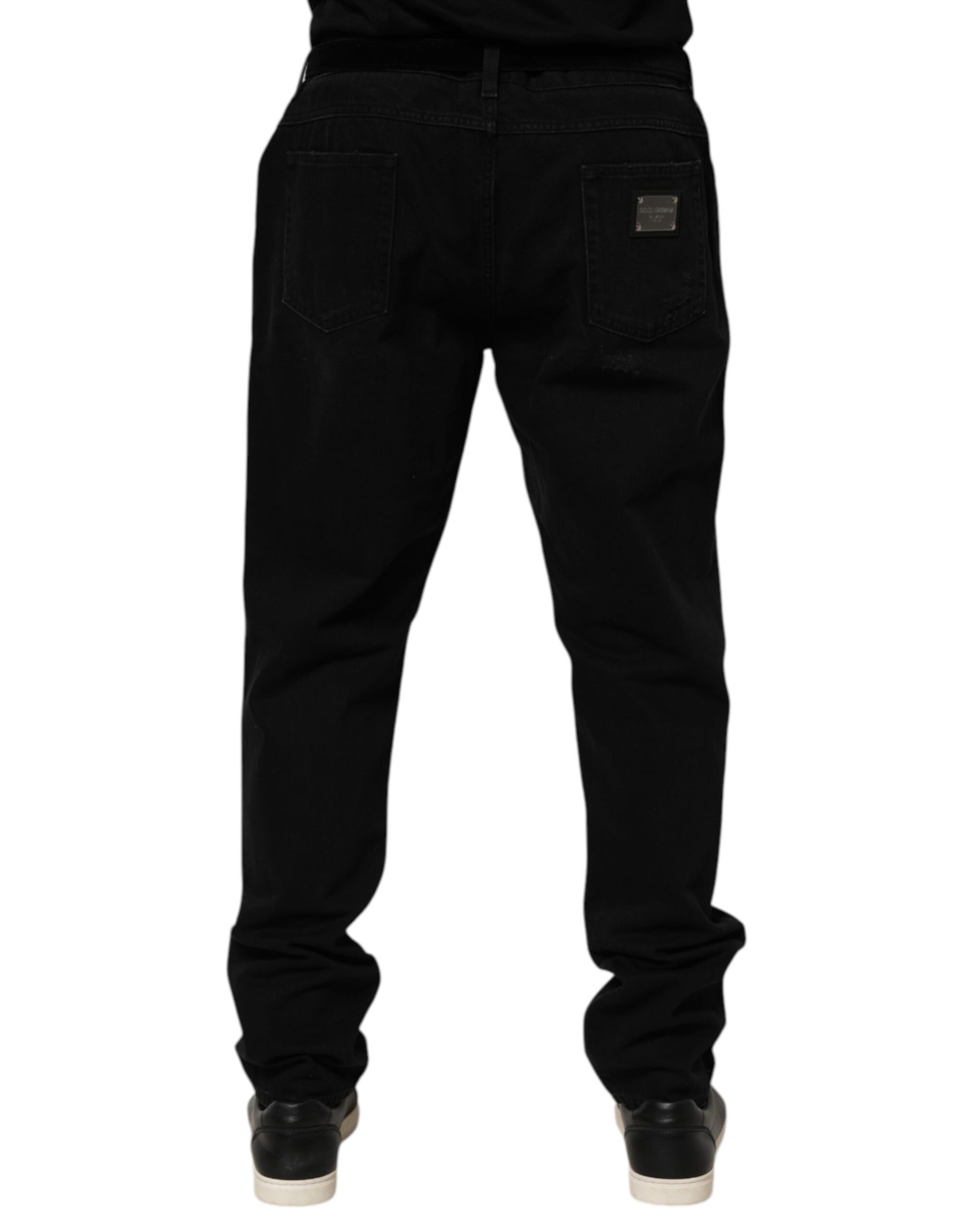 Pair of black jeans with pockets on sides