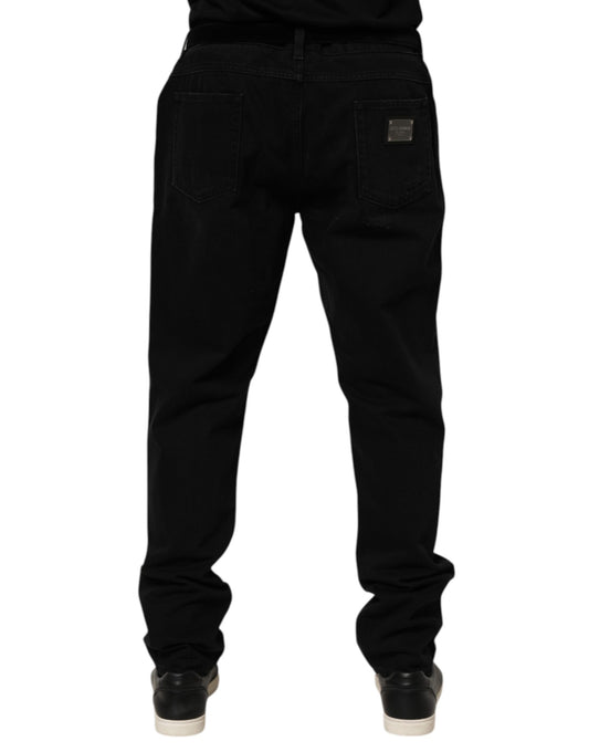 Pair of black jeans with pockets on sides
