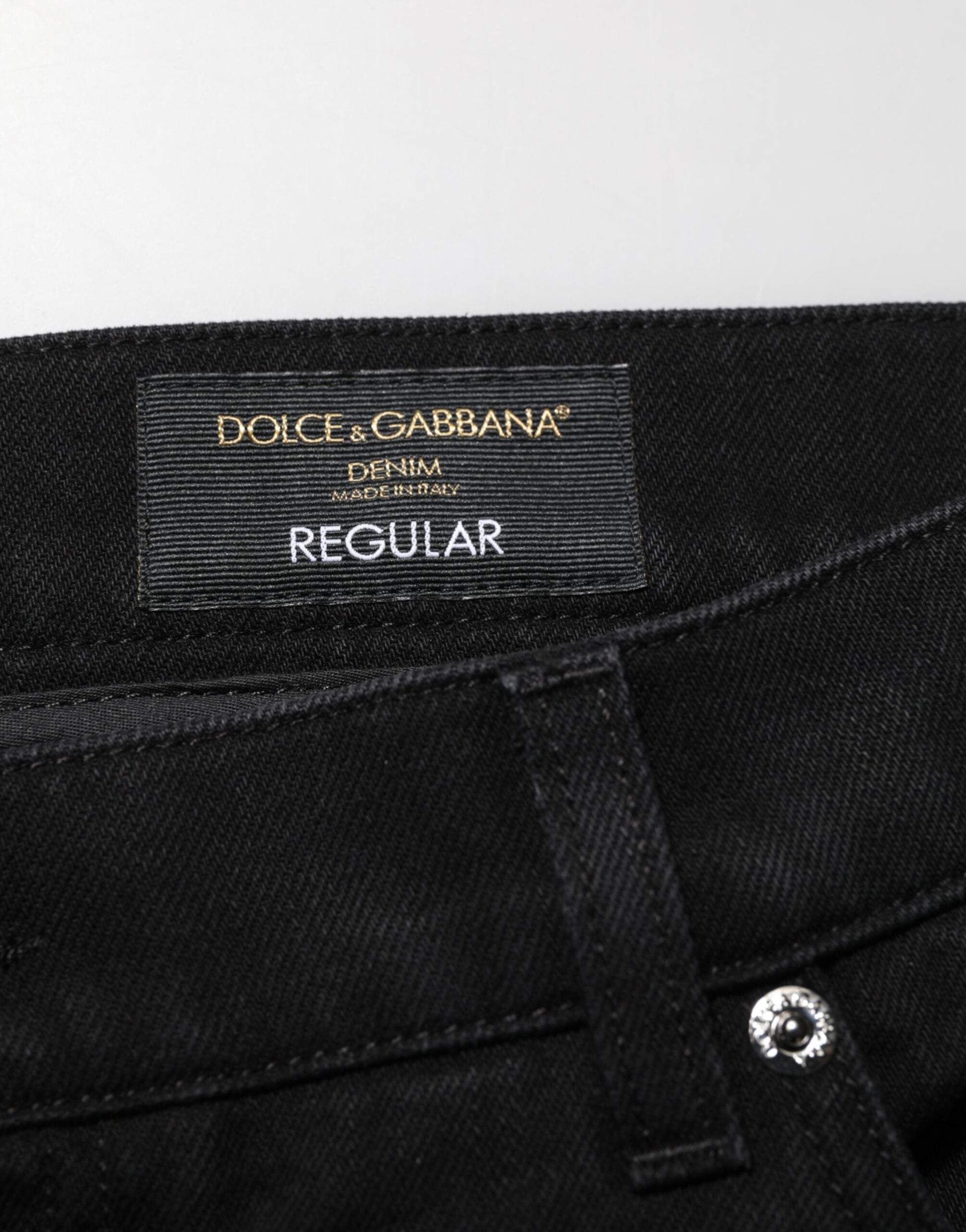 Black denim jeans with gold label