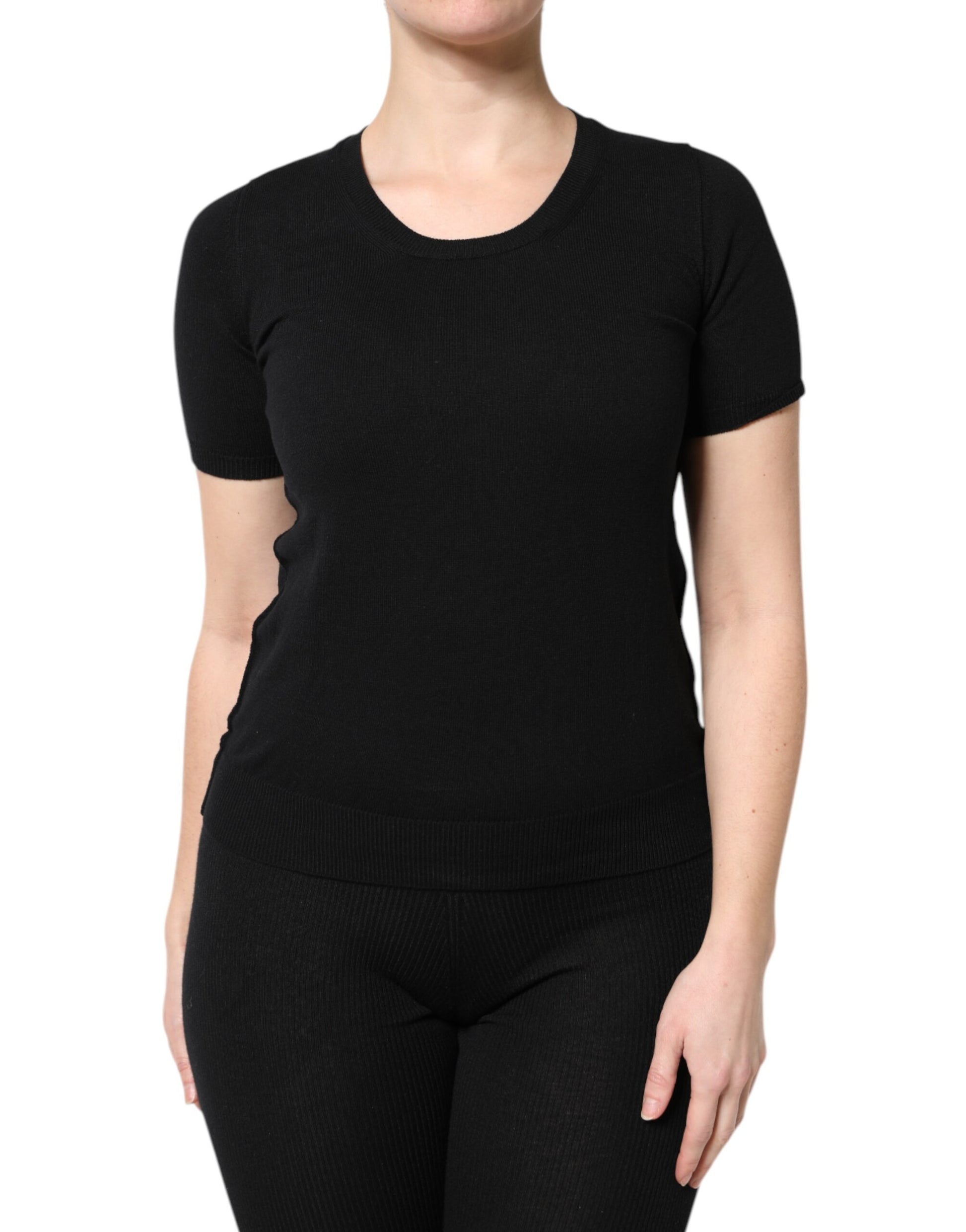 Black long sleeve top on woman