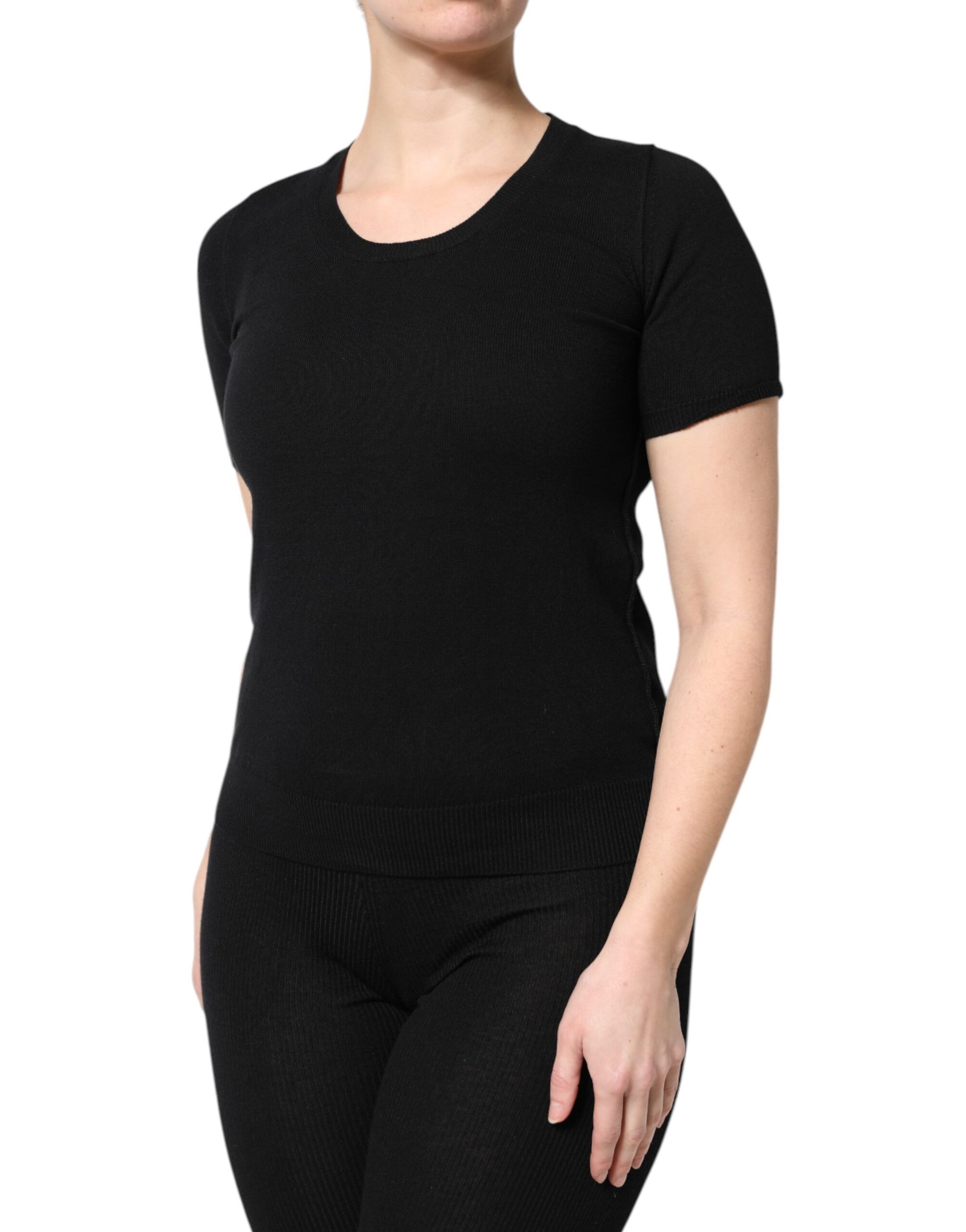 Black long sleeve top on woman