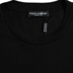A black cotton round neck t-shirt with short sleeves