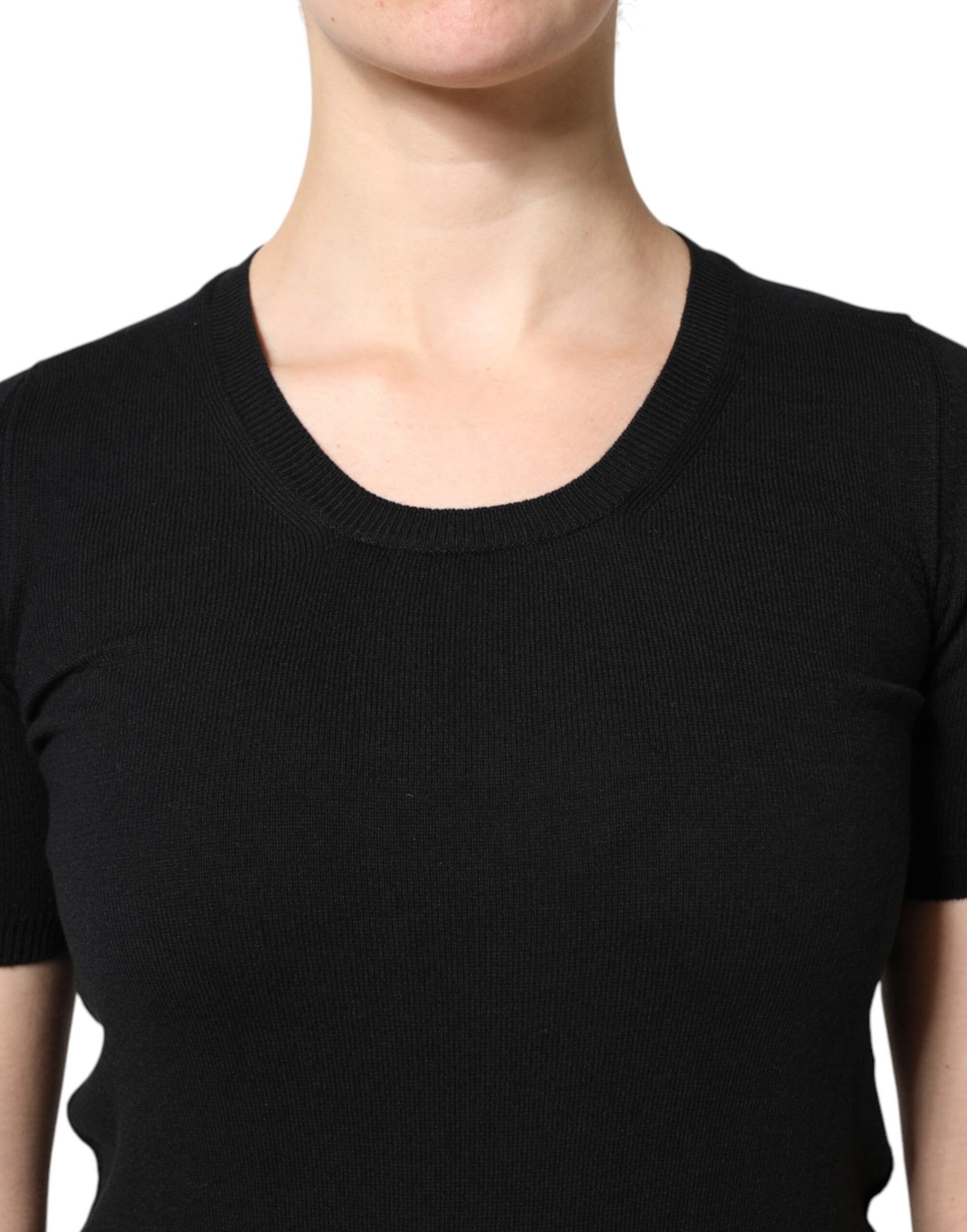 Black long sleeve top on a person
