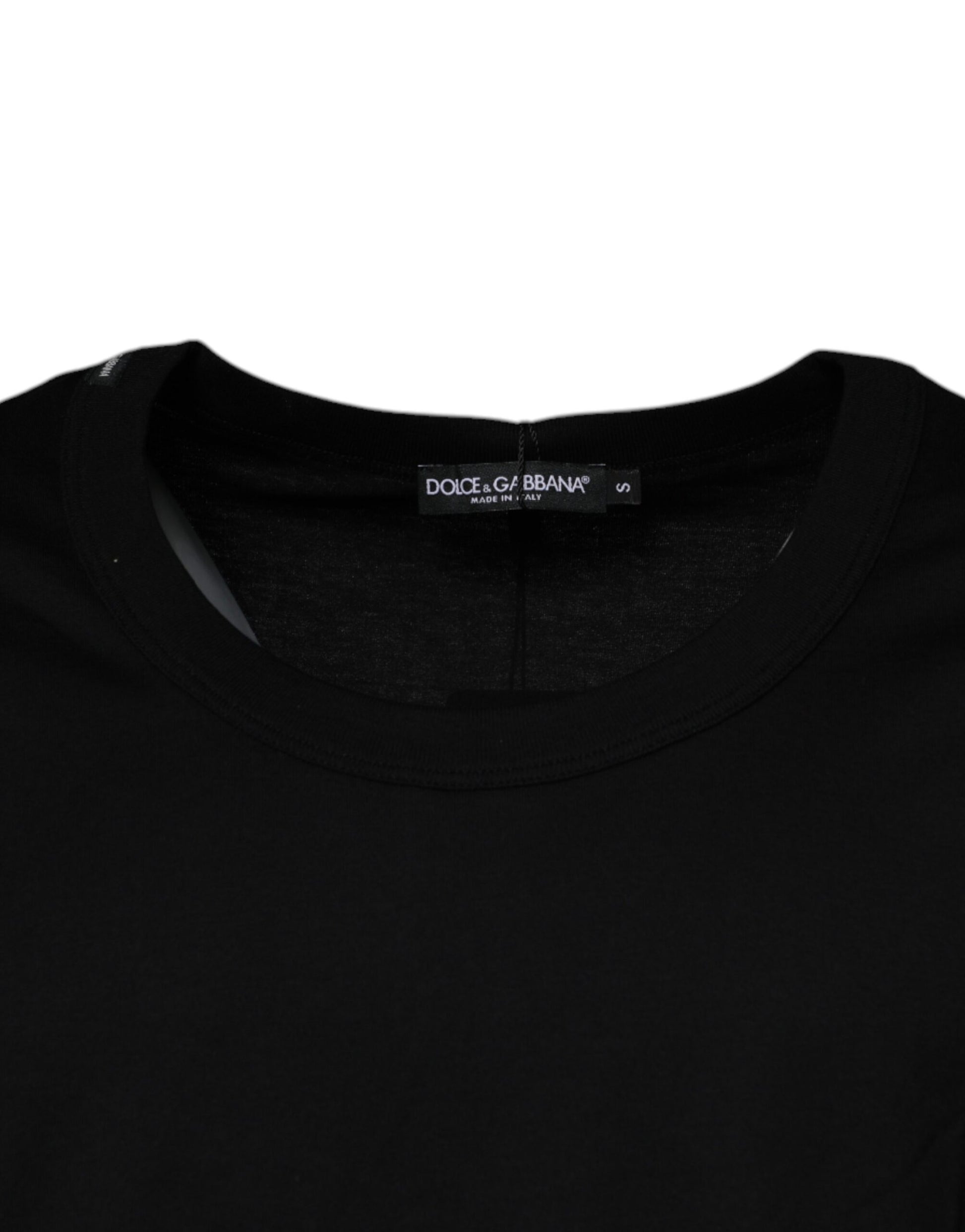 Black long sleeve shirt on hanger