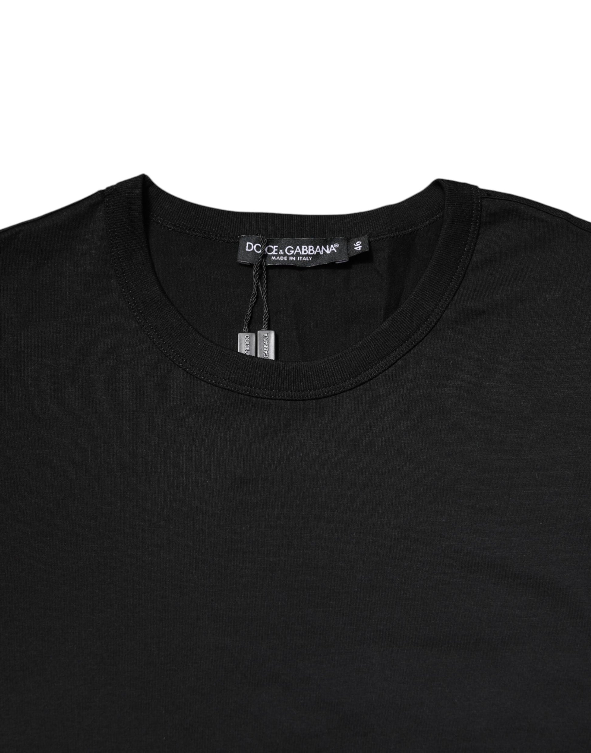 Black long sleeve shirt on hanger