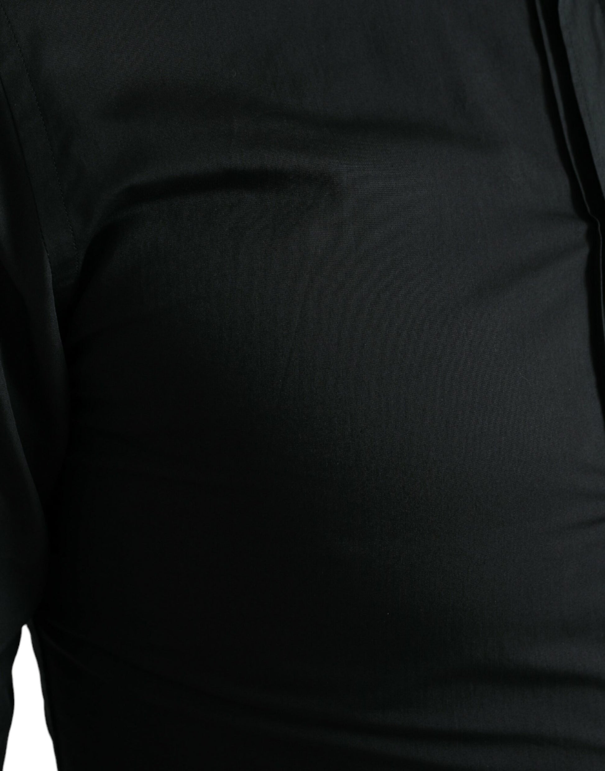 Black long sleeve shirt on a mannequin torso