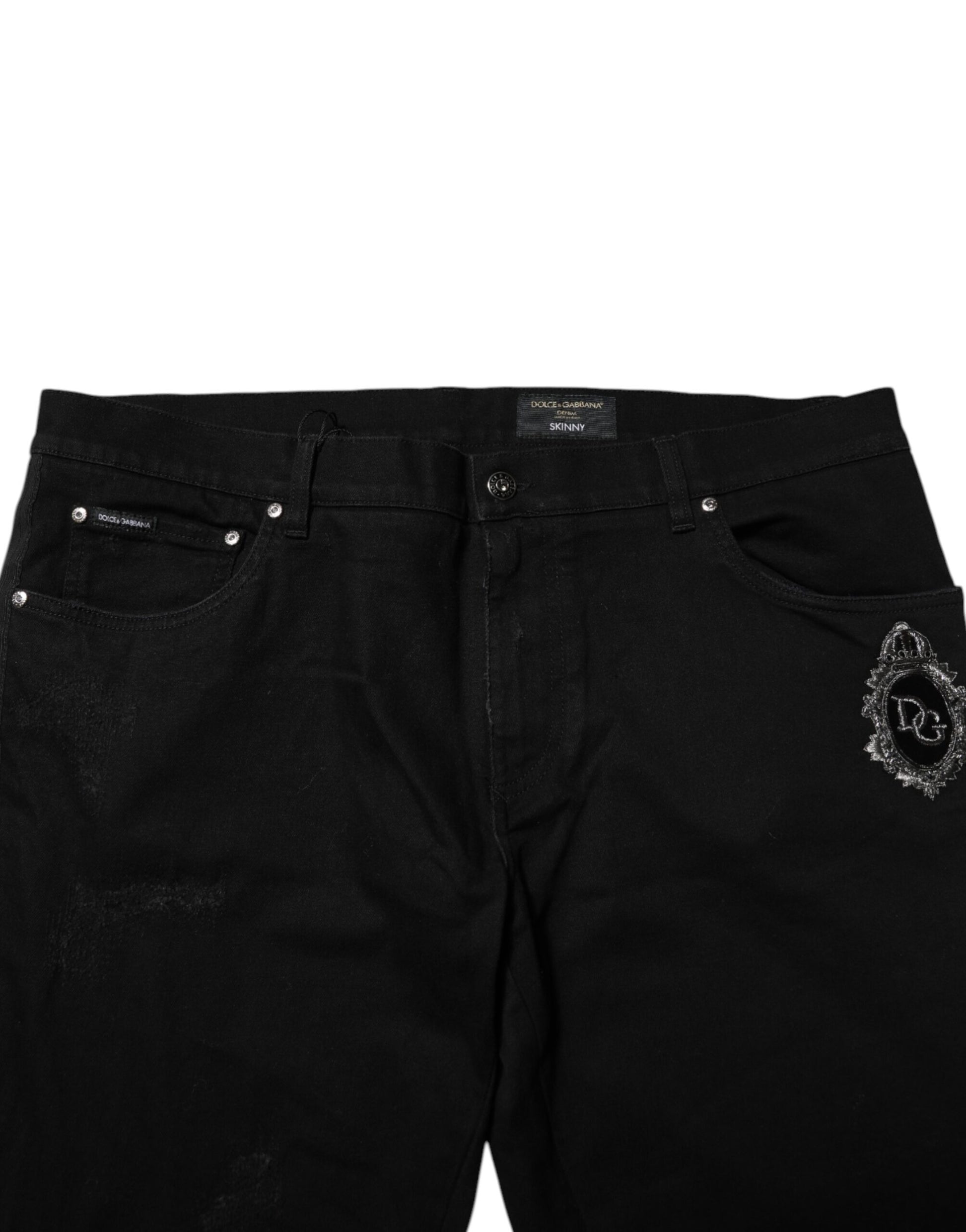 Black denim jeans with silver studs on waistband