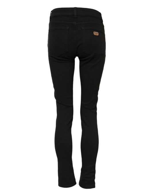 Pair of black jeans with a faded wash effect
