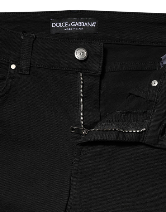 Black denim jeans with zippered pockets