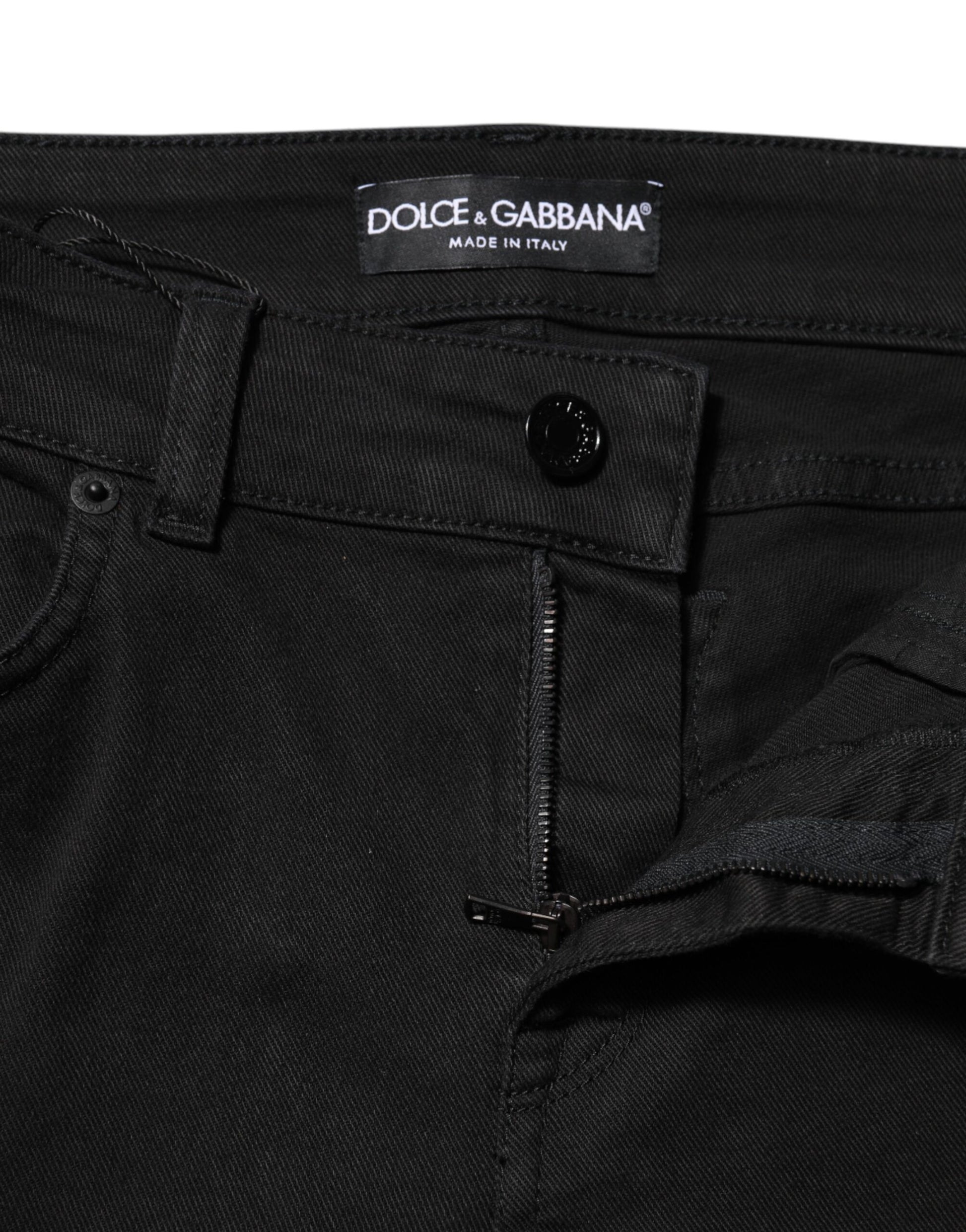 Pair of black jeans on a hanger