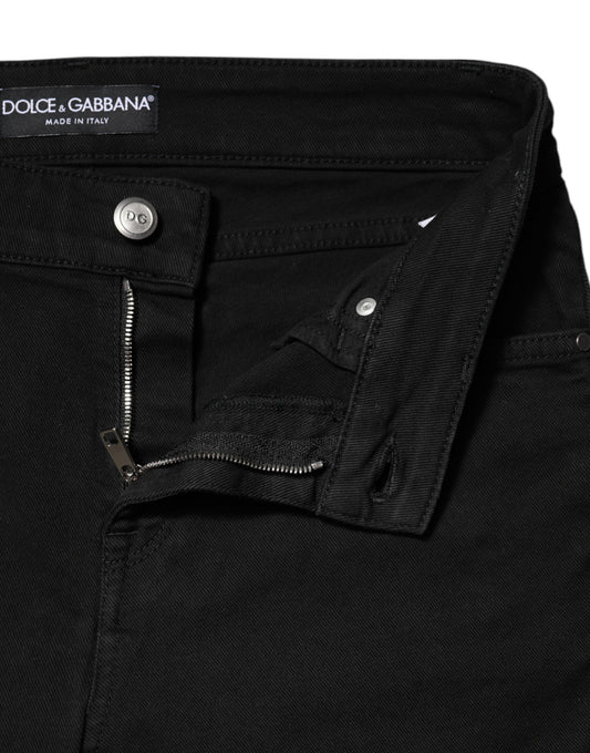 Black denim jeans with zippered side pockets