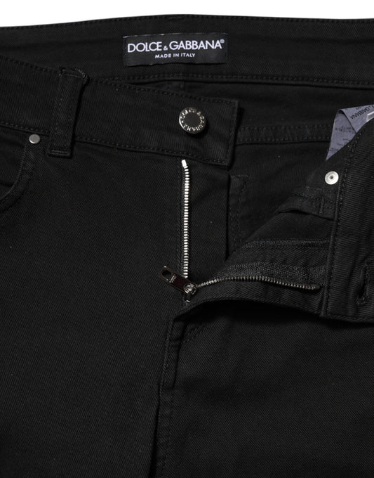 Pair of black jeans with zippered side pockets