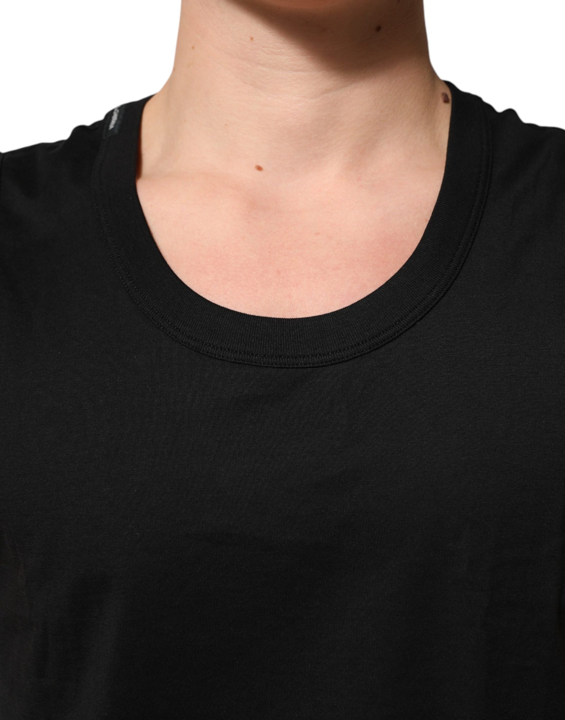 Black v neck t-shirt on a person