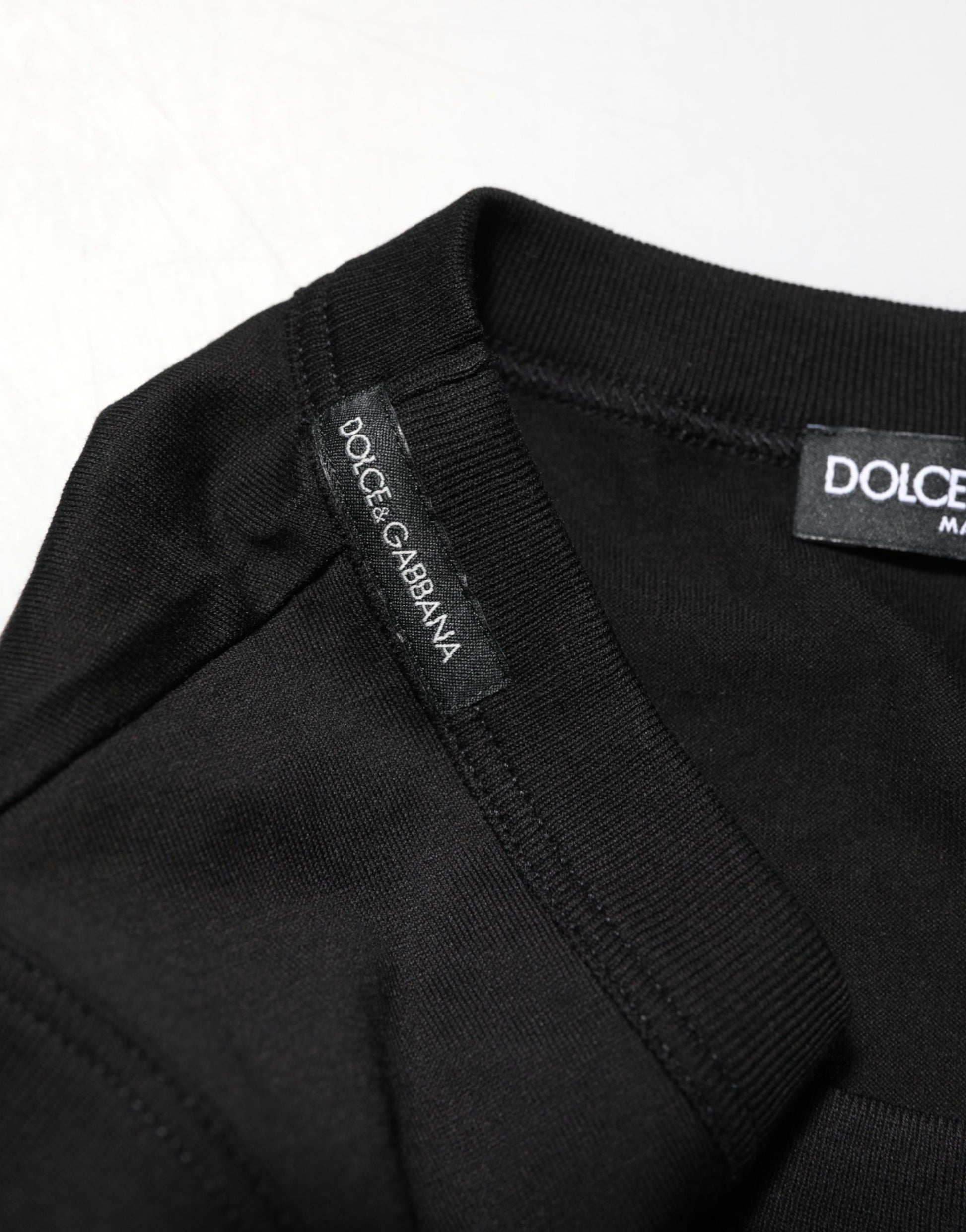 Black t-shirt with white label on inside