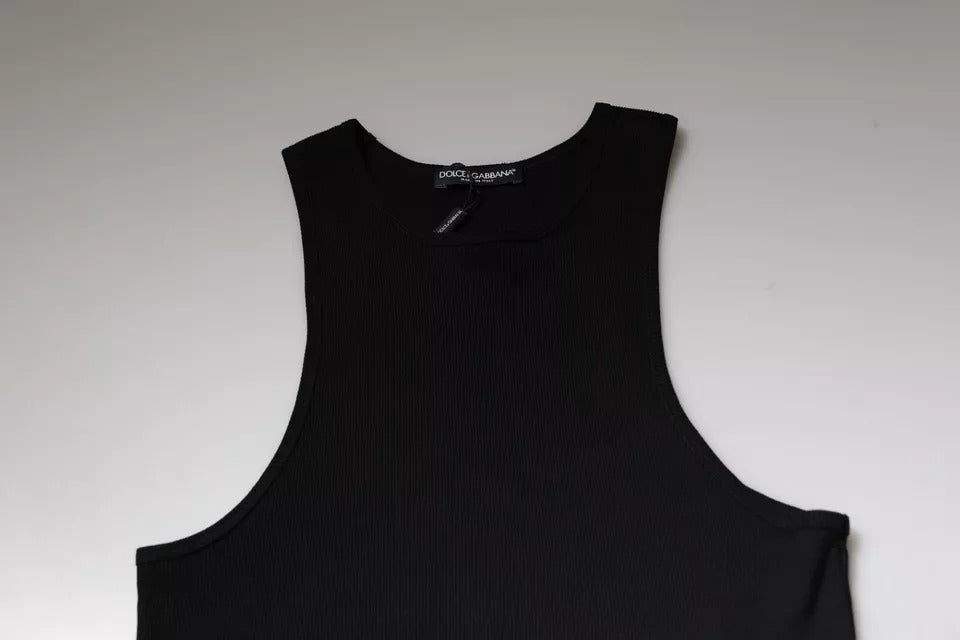 Black sleeveless tank top on a white surface