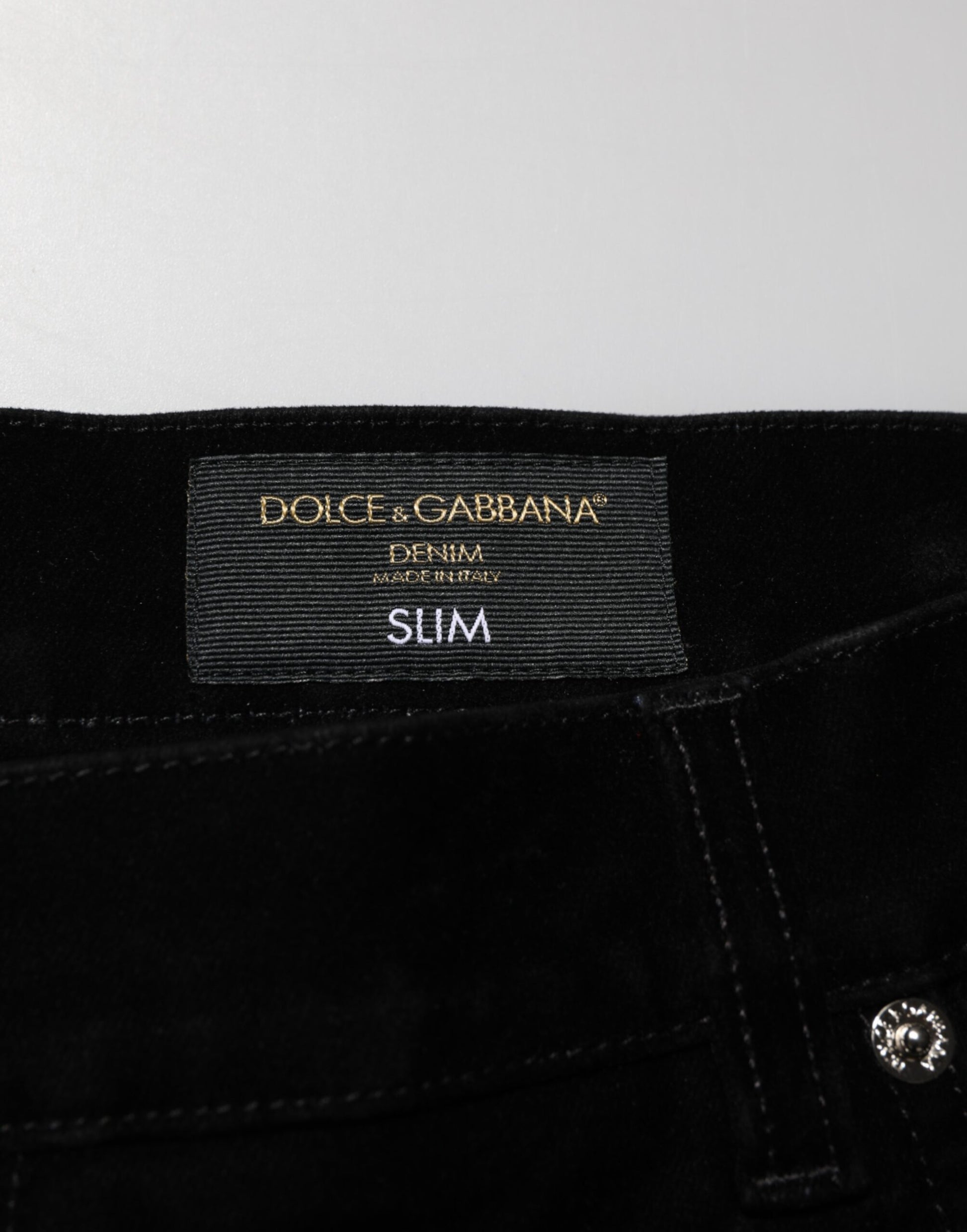 Black jeans with a label on the waistband