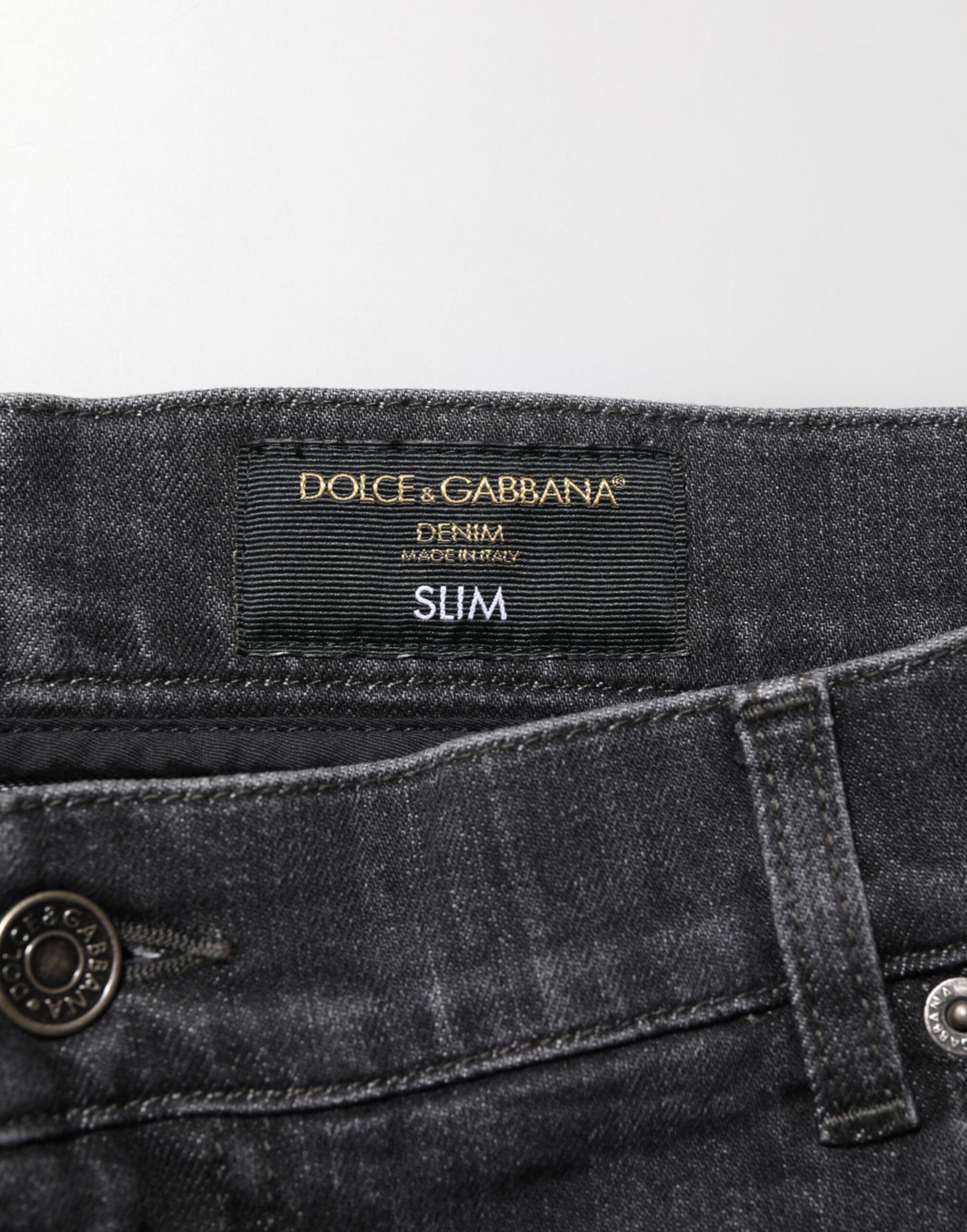 Pair of jeans with brand label on waistband