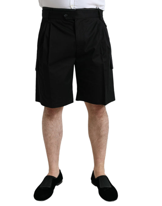 Man wearing black shorts and shoes