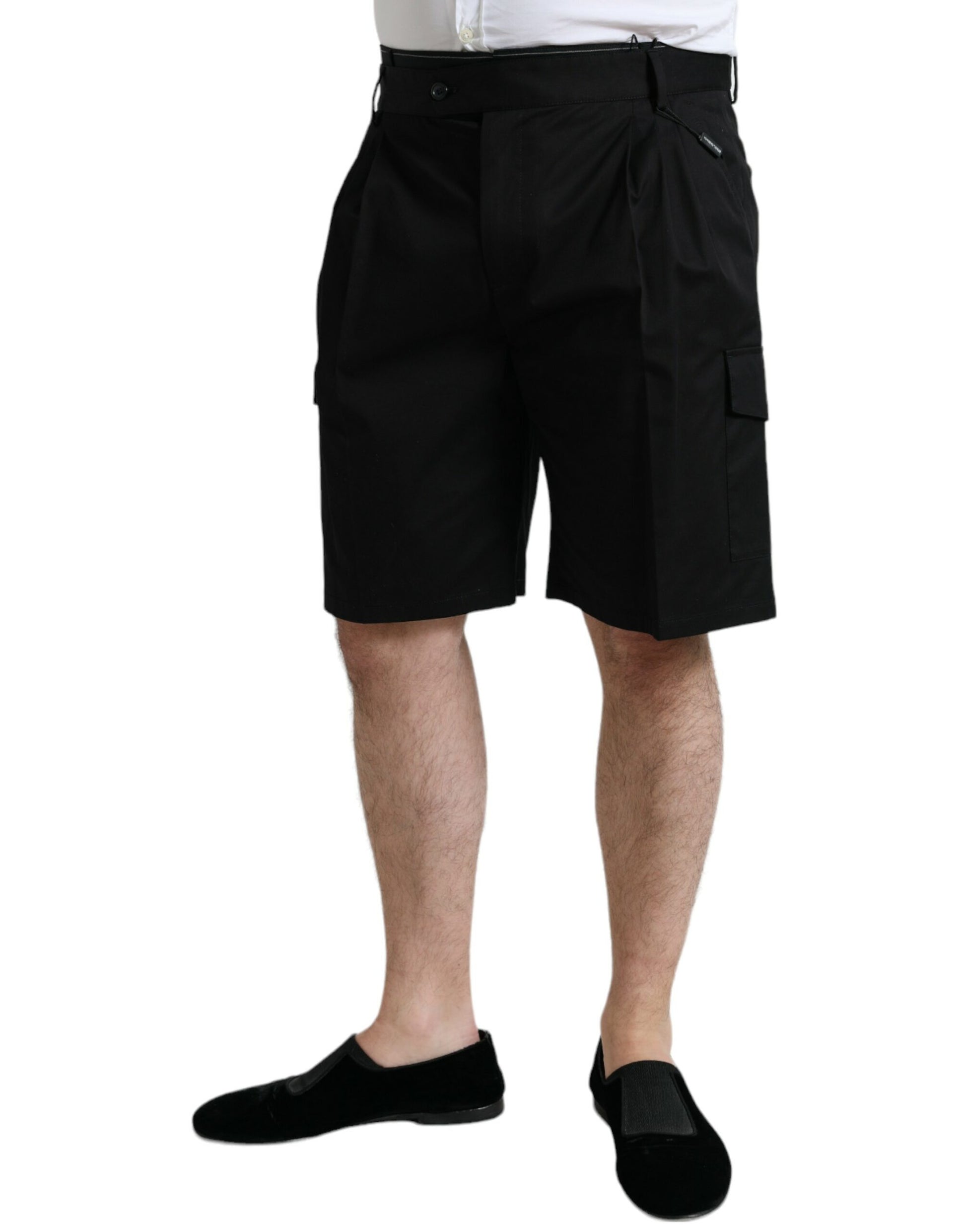 Man wearing black shorts and shoes