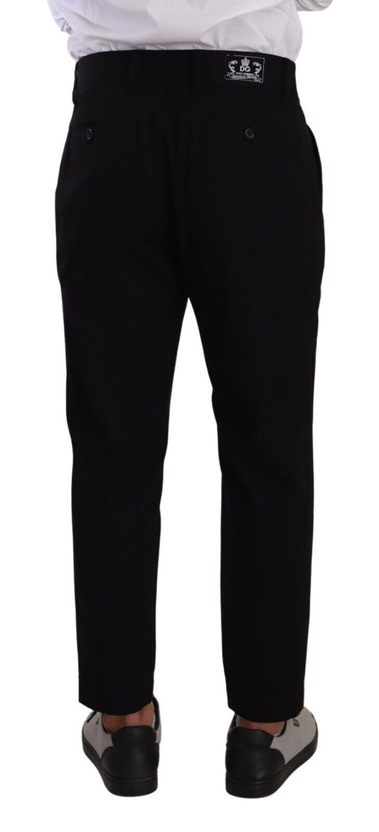 Pair of black dress pants with a white shirt and black shoes