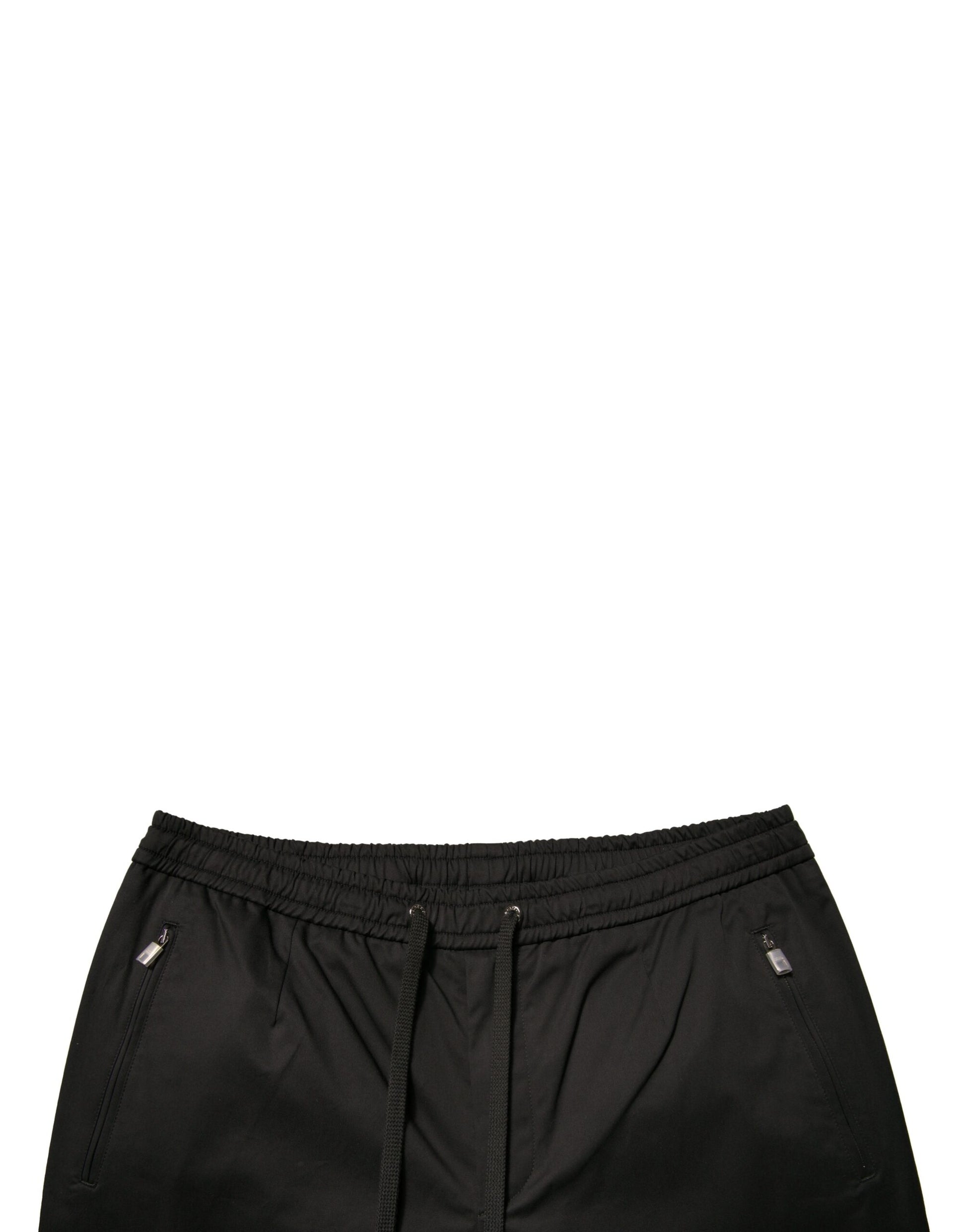 Black athletic shorts with white stripe down side