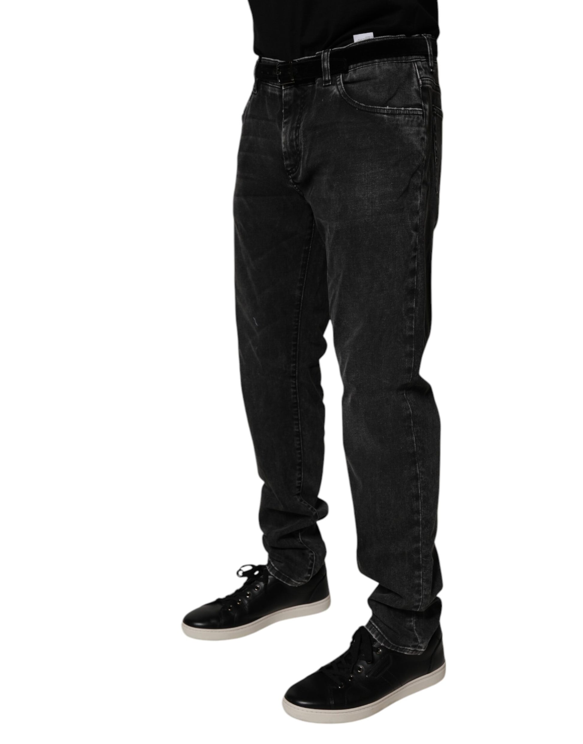 Man wearing black jeans and shoes