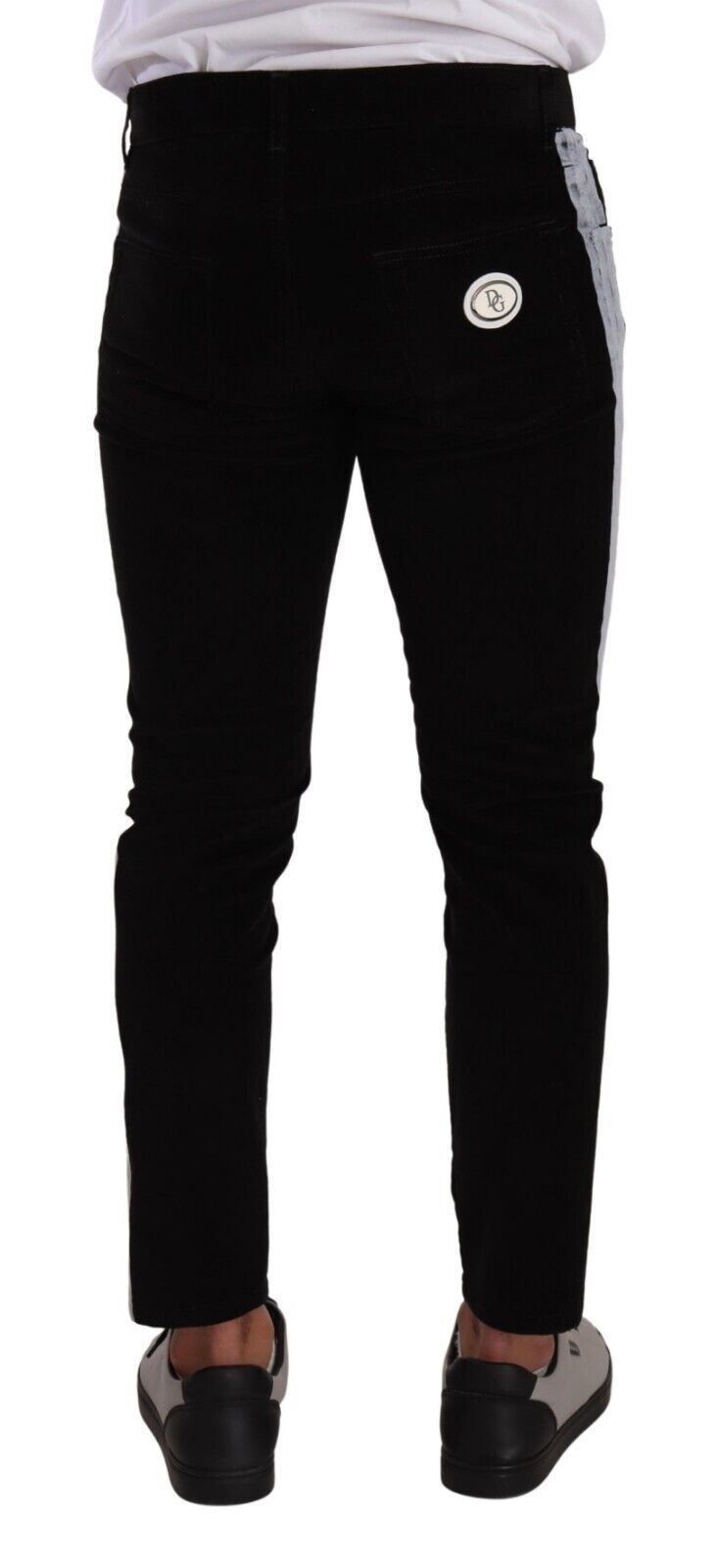 Pair of black pants with white stripe down side