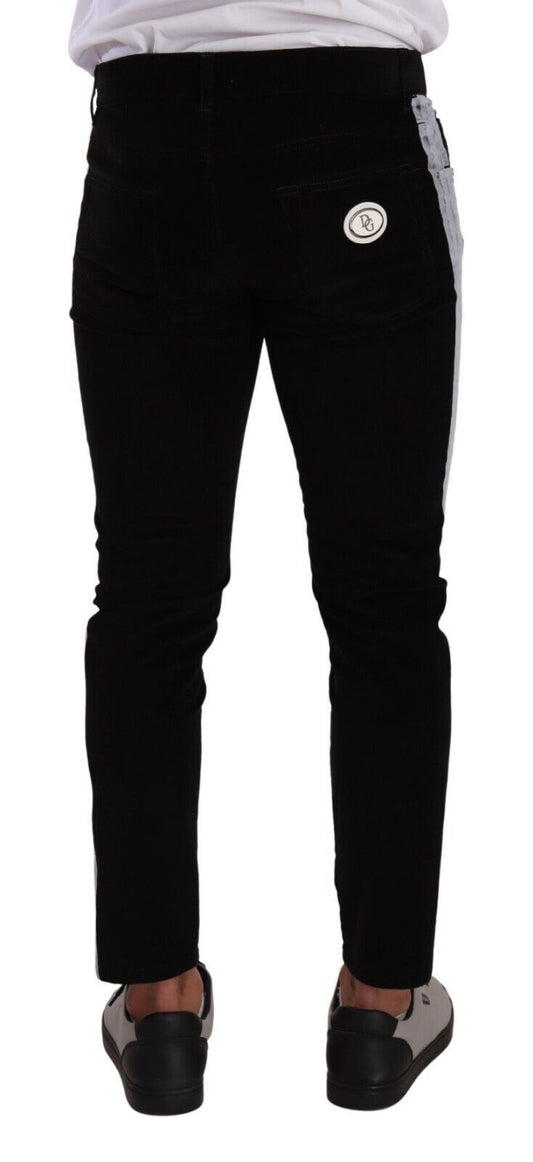 Pair of black pants with white stripe down side