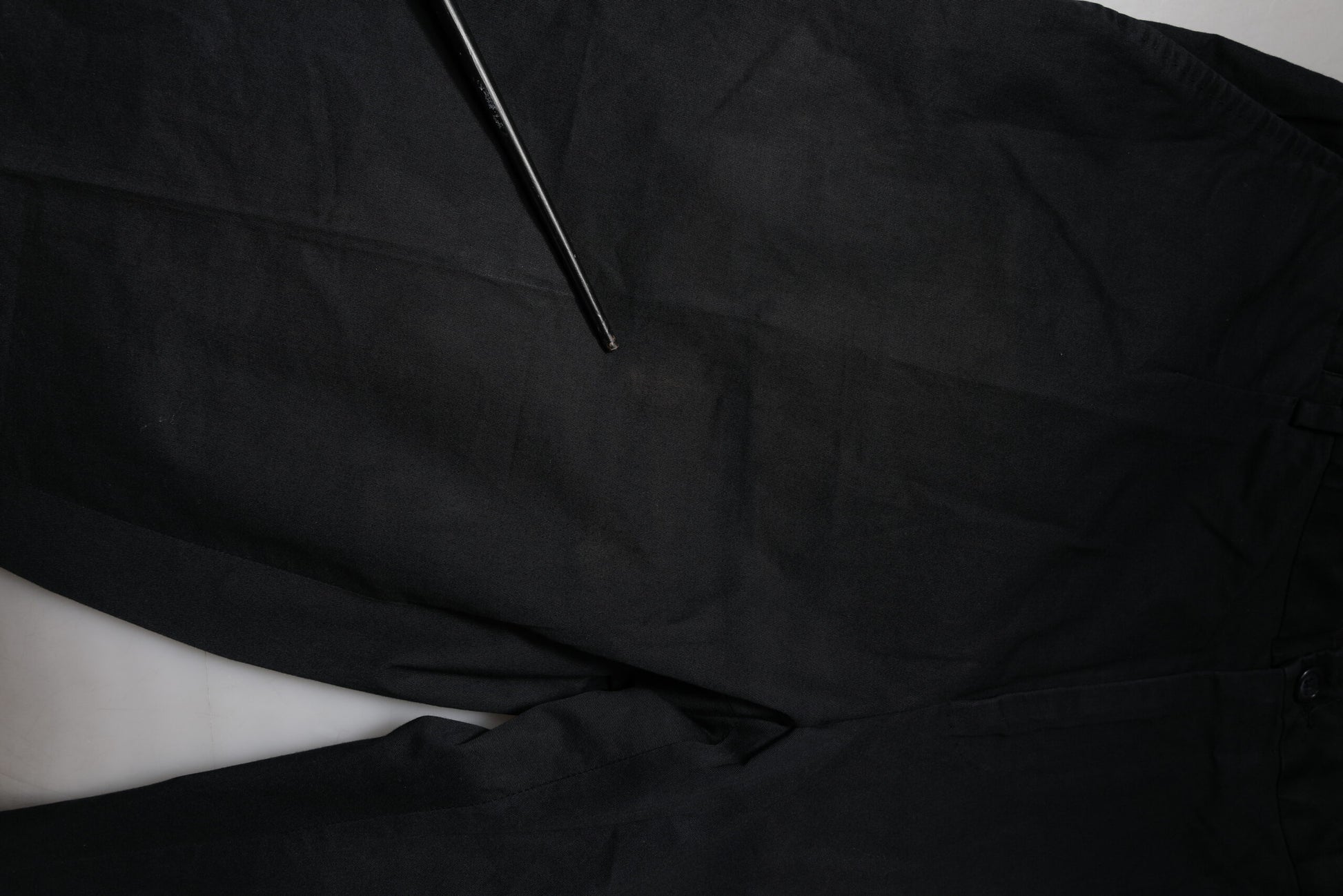 A pair of black cotton stretch skinny dress pants by Dolce & Gabbana