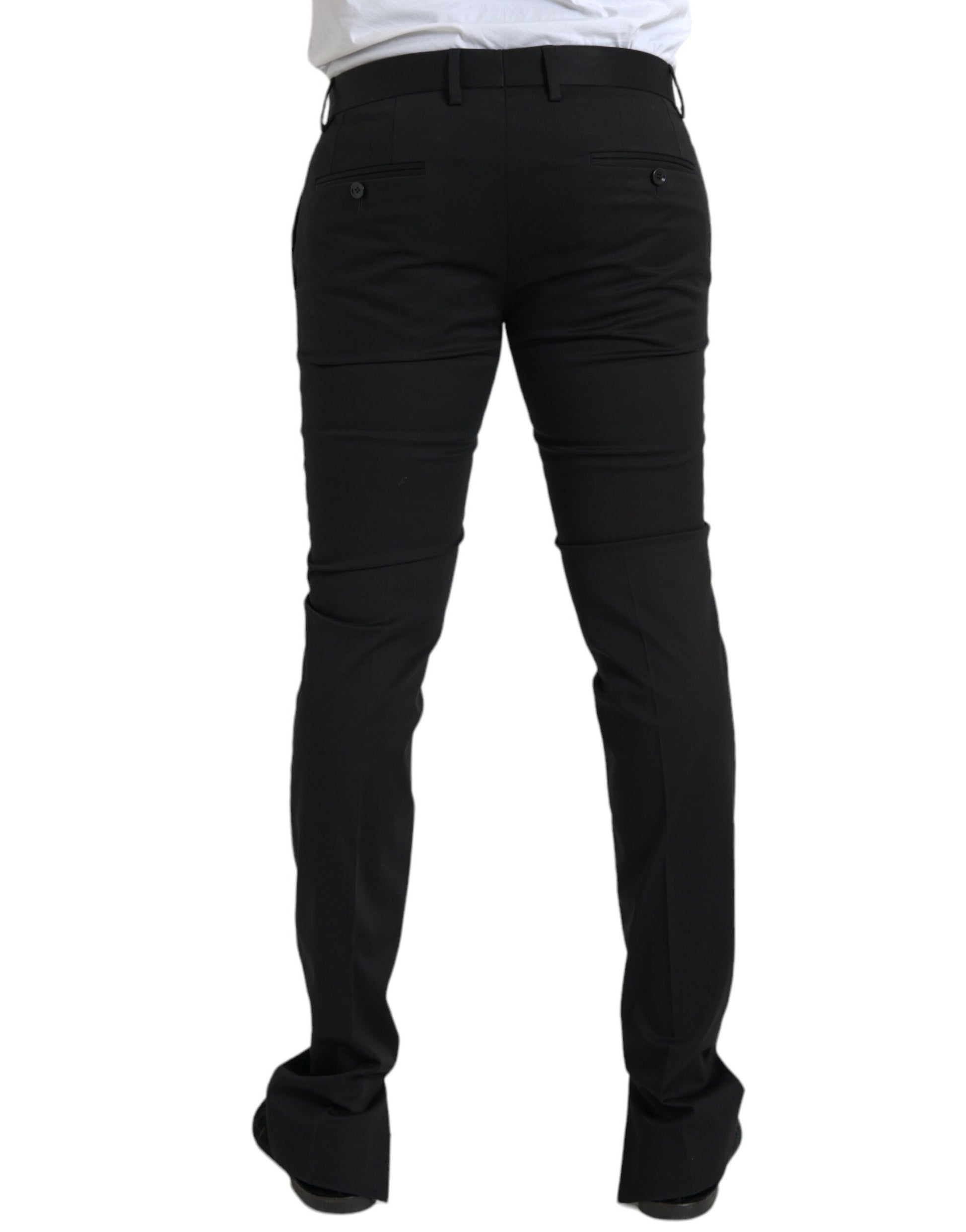 A pair of black stretch skinny dress pants by Dolce & Gabbana, made of cotton
