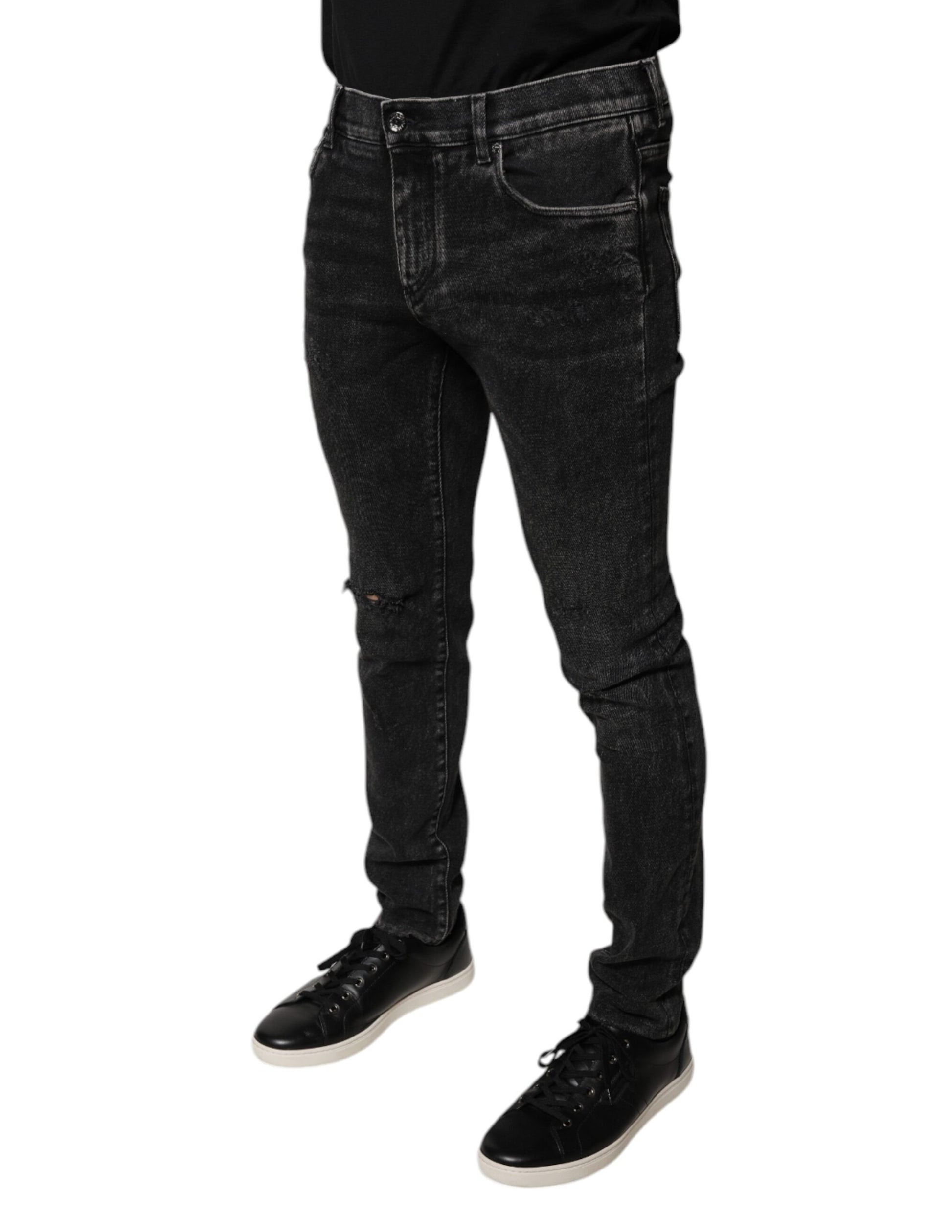 Man wearing black jeans and shoes