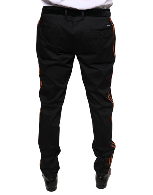 A pair of black cotton stretch skinny men's dress pants with red stripe detailing