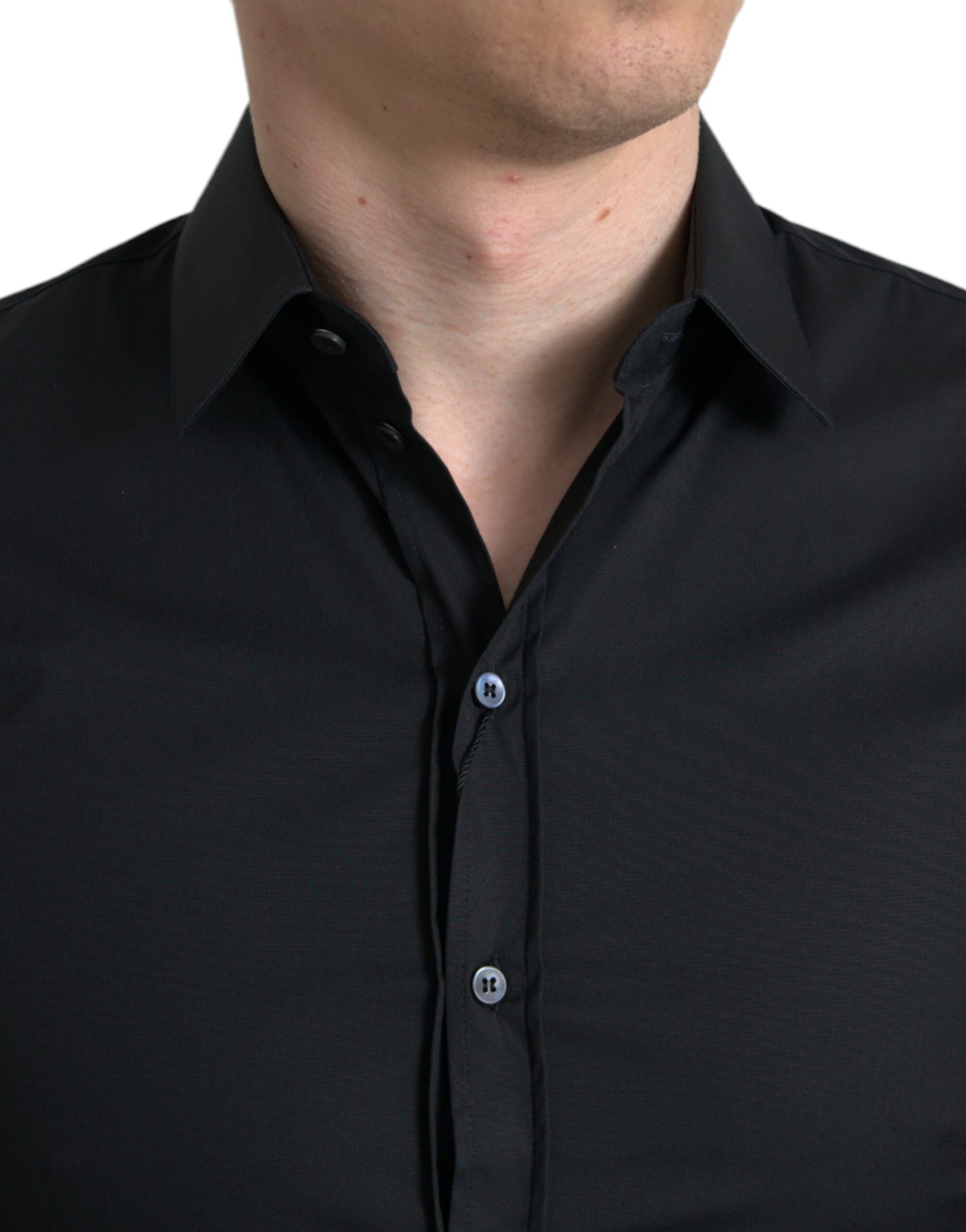 Man wearing black shirt with collar